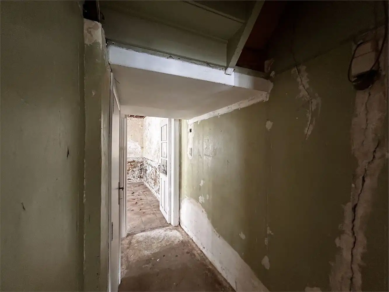 Te renoveren handelshuis met woonst foto 12