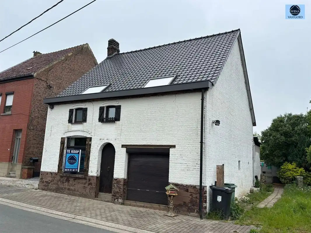 Hoofdfoto van de publicatie: WONING MET 4 KAMERS EN TUIN