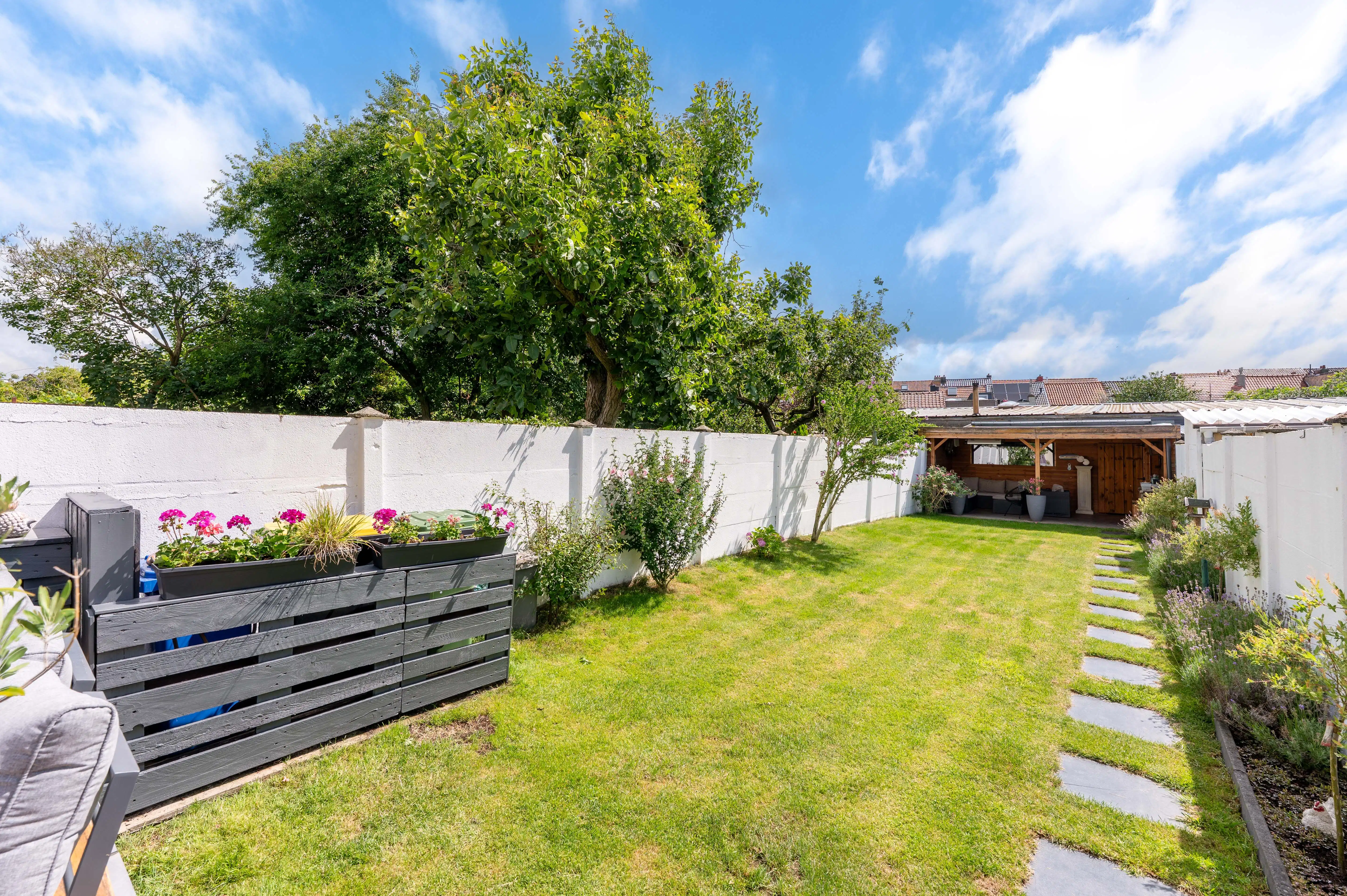 Instapklare gezinswoning met een gezellige tuin, vlak bij het centrum van Merksem! foto 25