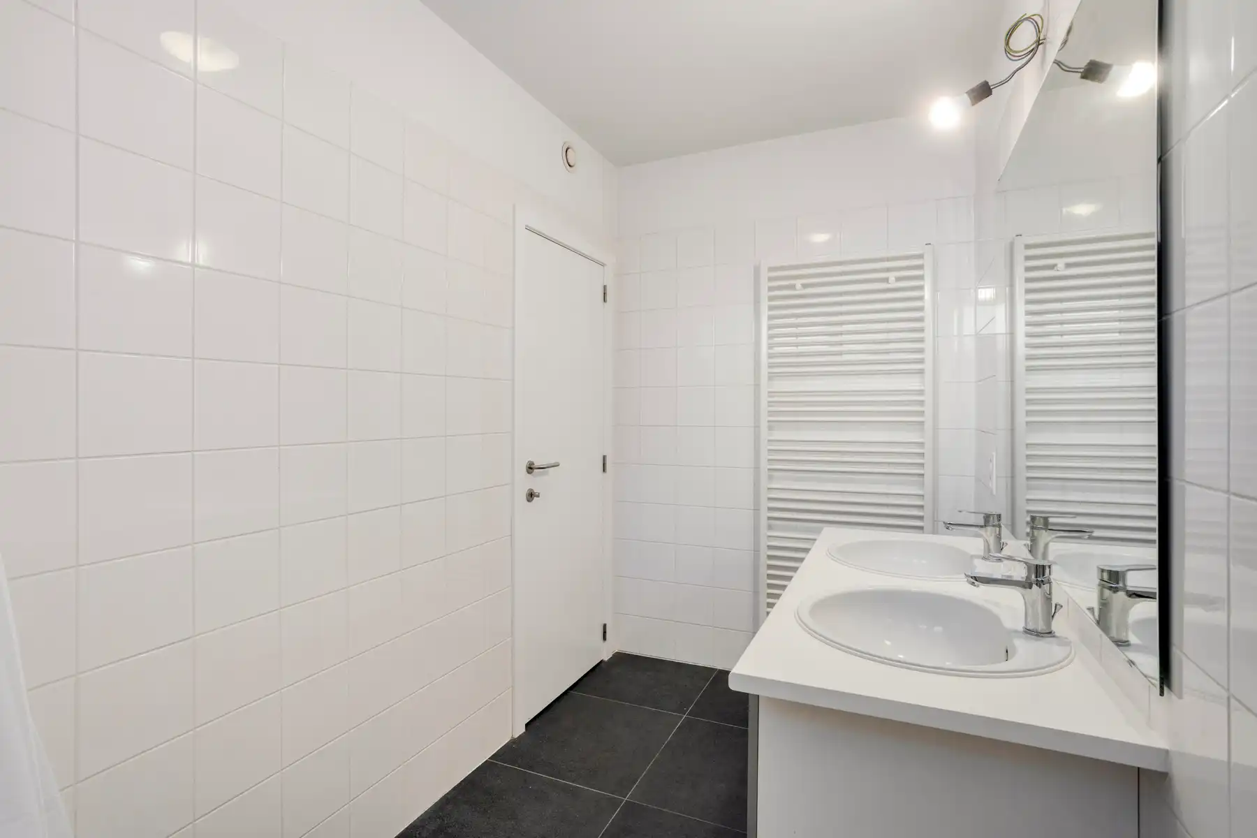 Leemans Immobiliën biedt u dit energiezuinige appartement aan met een adembenemend uitzicht over Brussel. foto 14