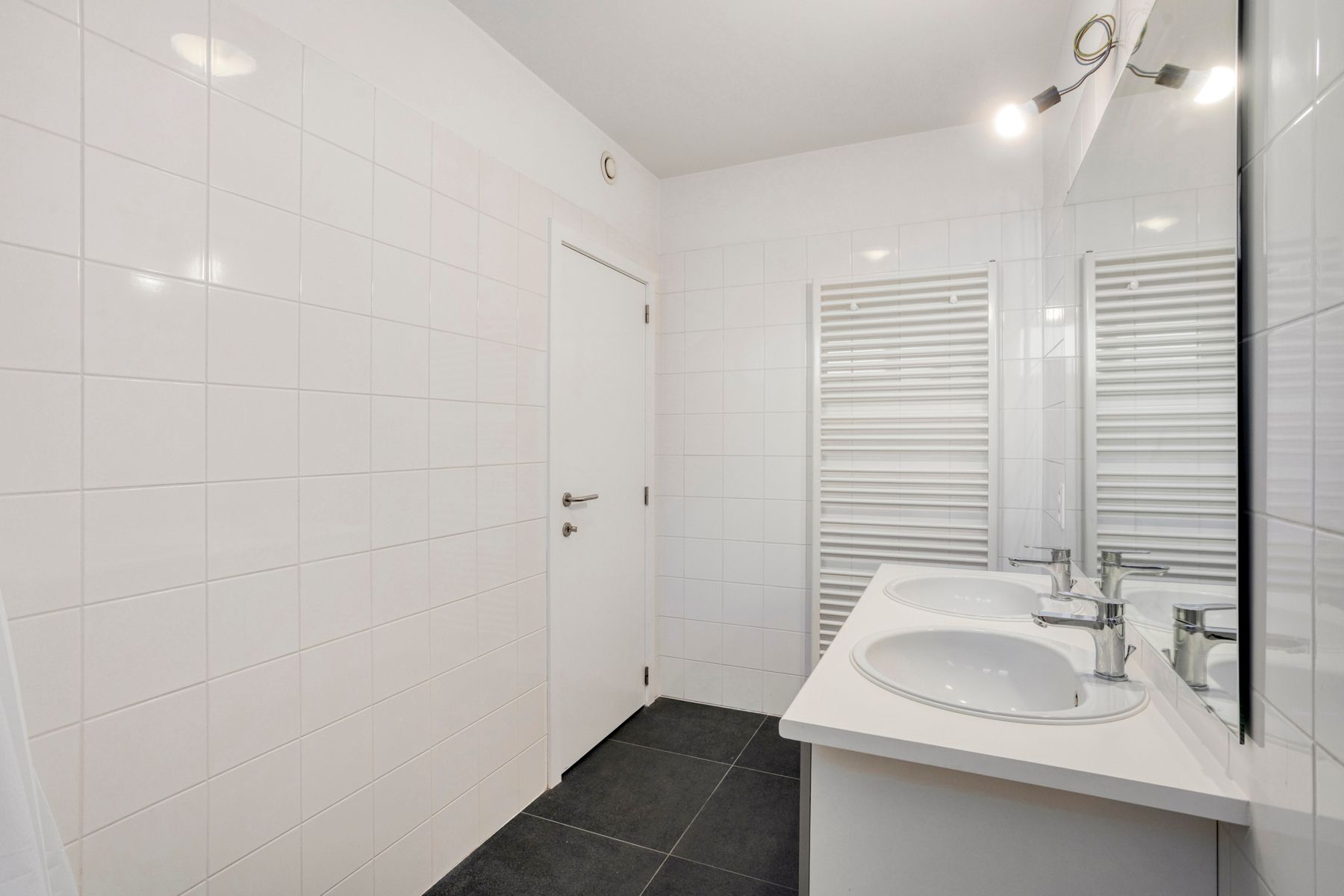 Leemans Immobiliën biedt u dit energiezuinige appartement aan met een adembenemend uitzicht over Brussel. foto 14