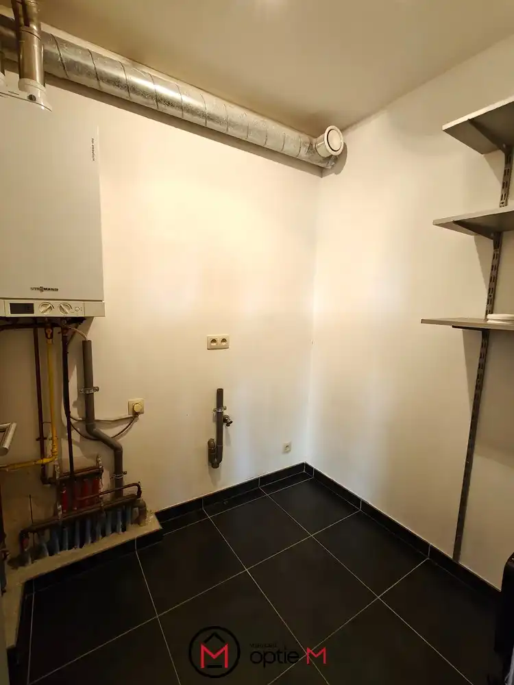 Appartement te huur in Genk – gelijkvloers wonen met tuin en overdekt terras foto 8