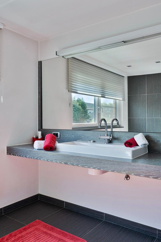 Stijlvol wonen in As: ruime, instapklare woning met tuin en garage foto 33