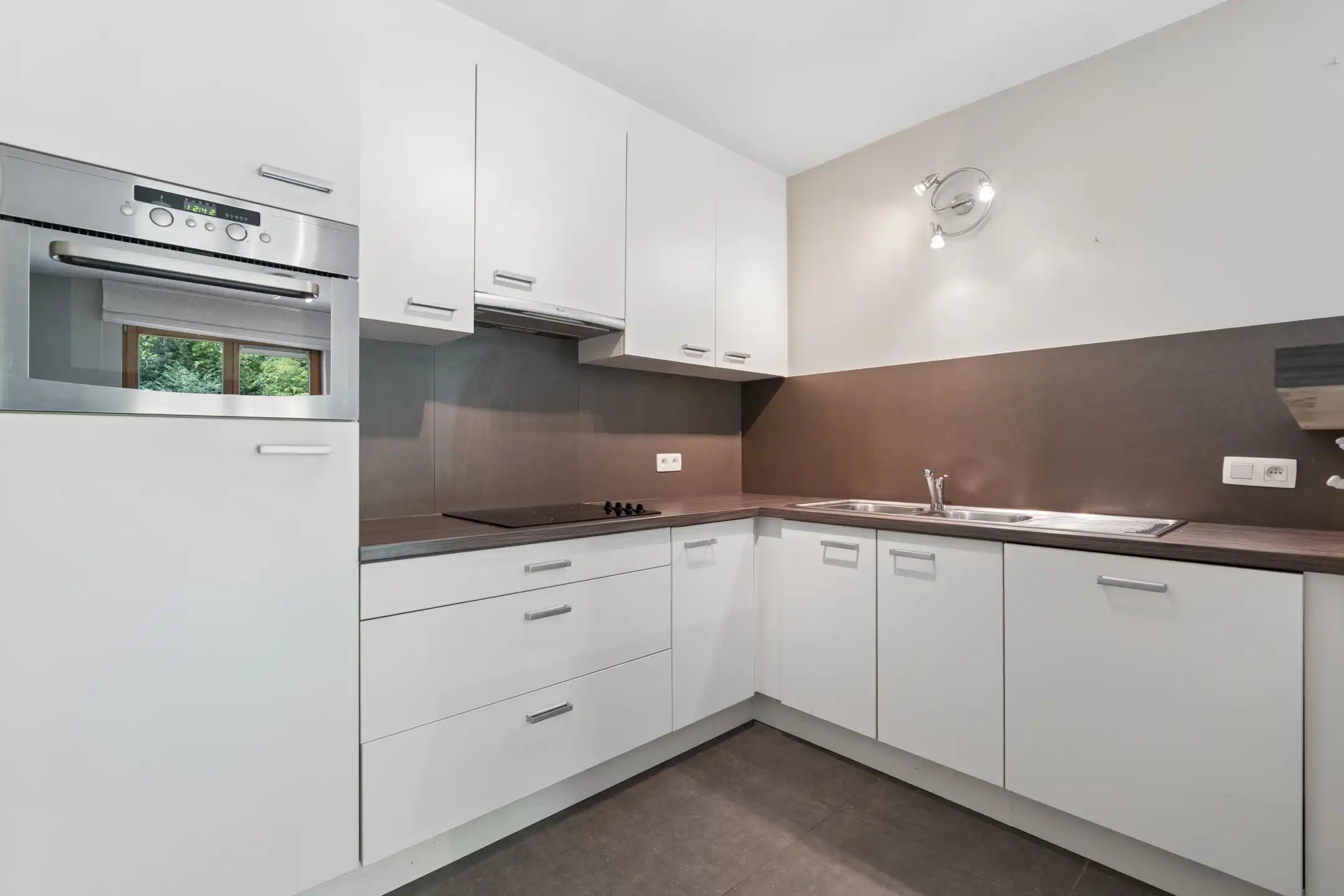 Rustig gelegen gelijkvloers appartement met 2 slaapkamers foto 6