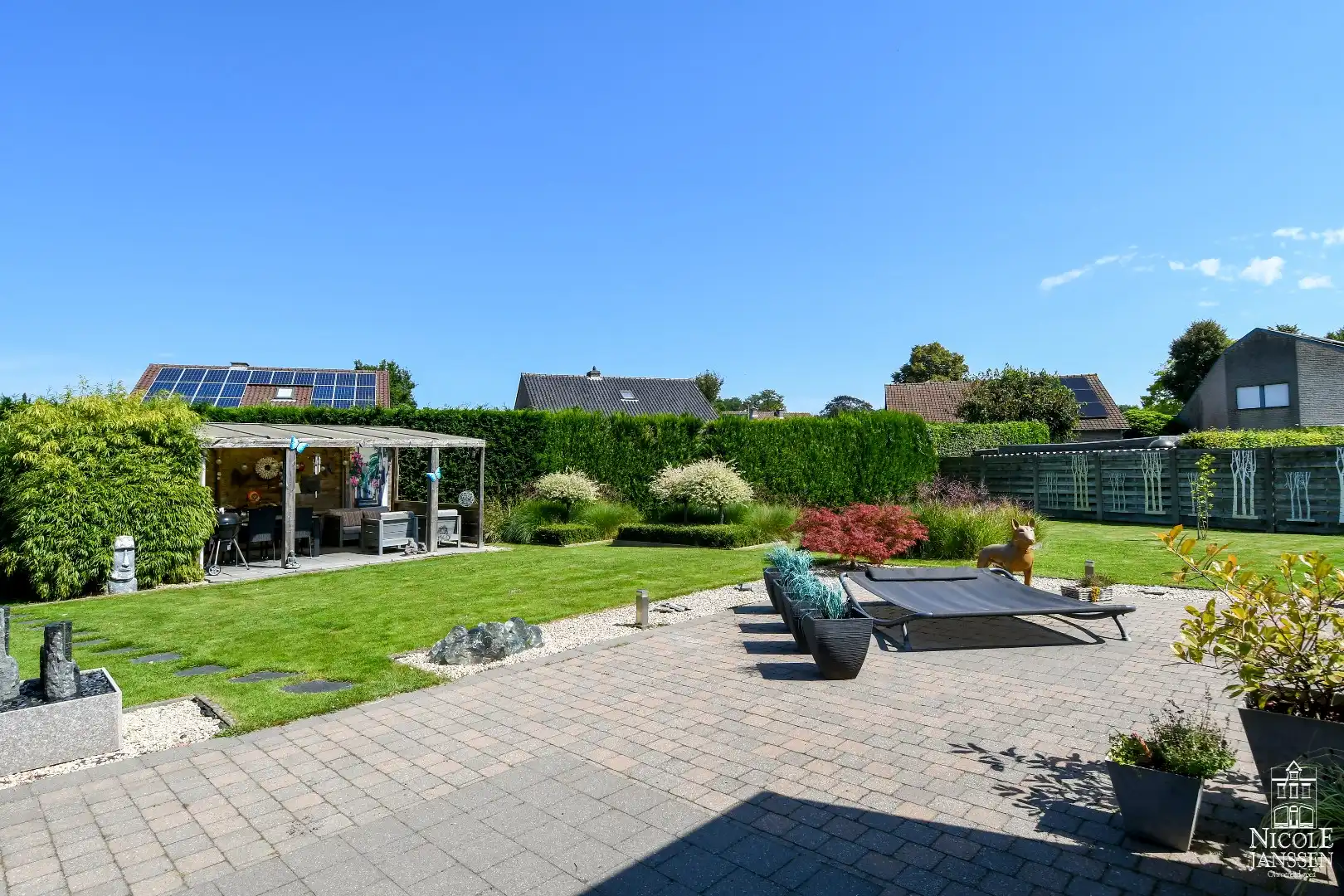 Instapklare gezinswoning met drie slaapkamers en verzorgde tuin! foto 26