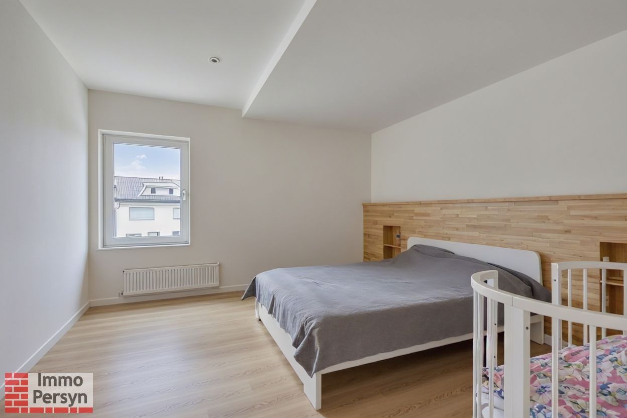 Moderne gezinswoning met 3 slaapkamers en gezellige tuin foto 15