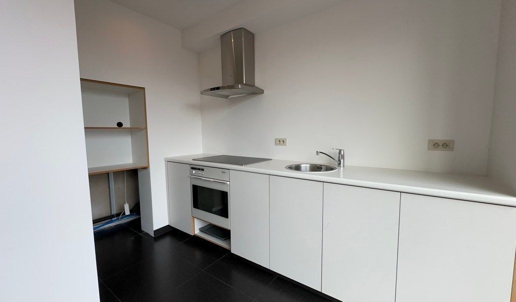 Handelspand met ruime garage te koop in Melle foto 8