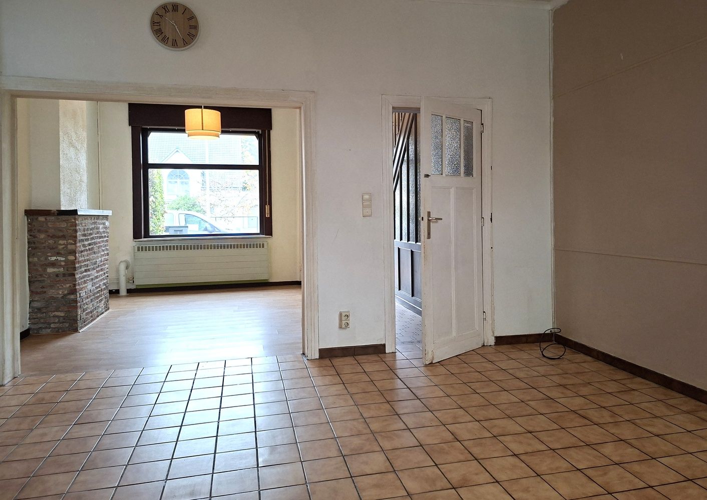 Licht te renoveren woning / 4 slaapkamers en tuin / centrale ligging foto 8