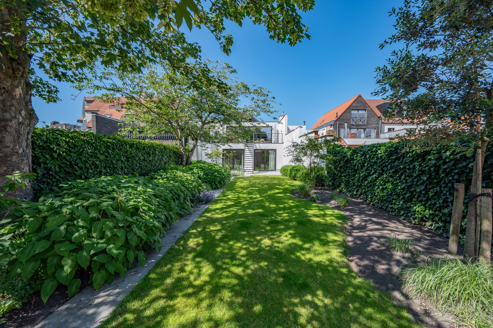 Recent gerenoveerde woning met 4 slaapkamers en perfect georiënteerde tuin foto 31