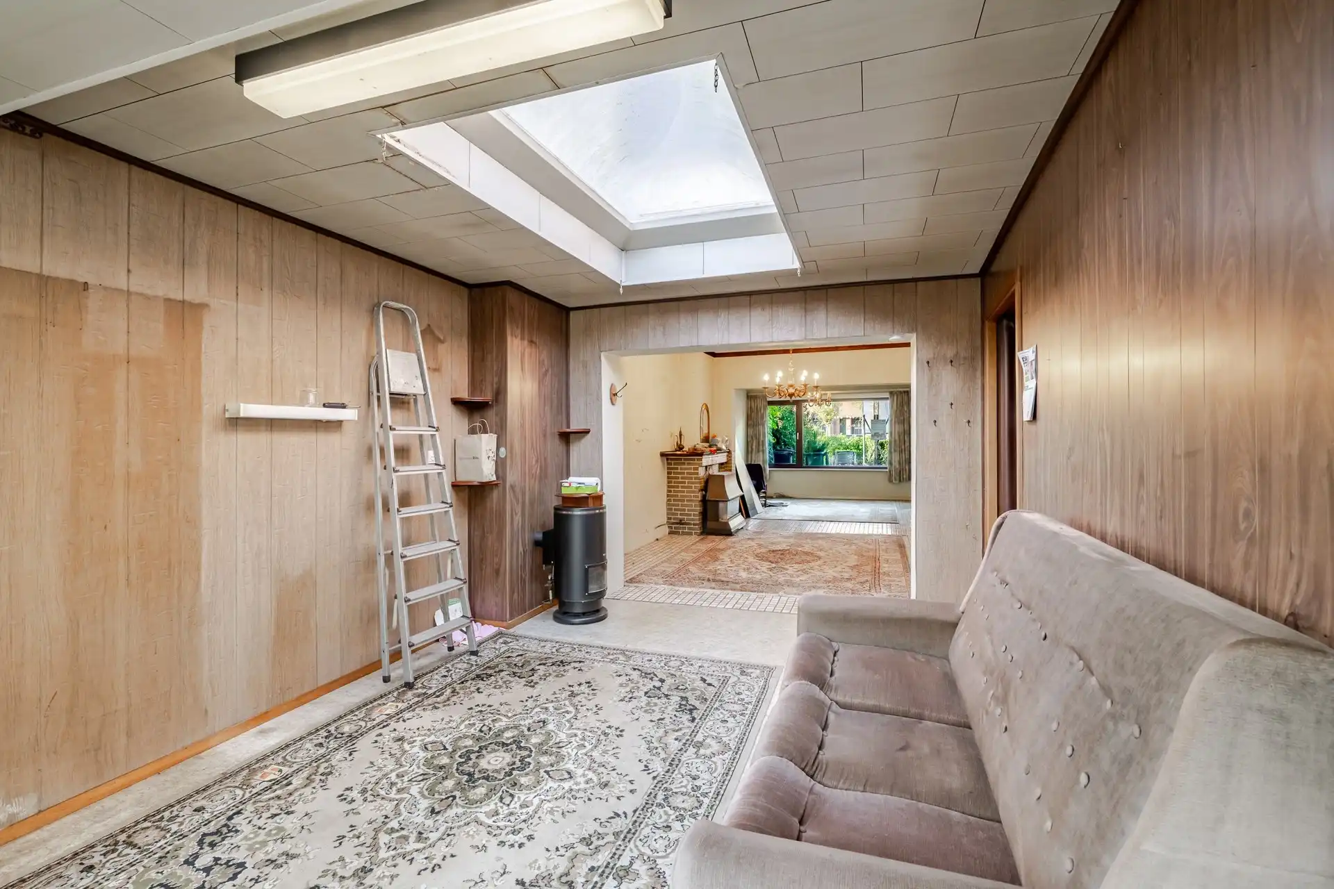 Charmante rijwoning met garage en groene tuin, klaar voor jouw stempel foto 12