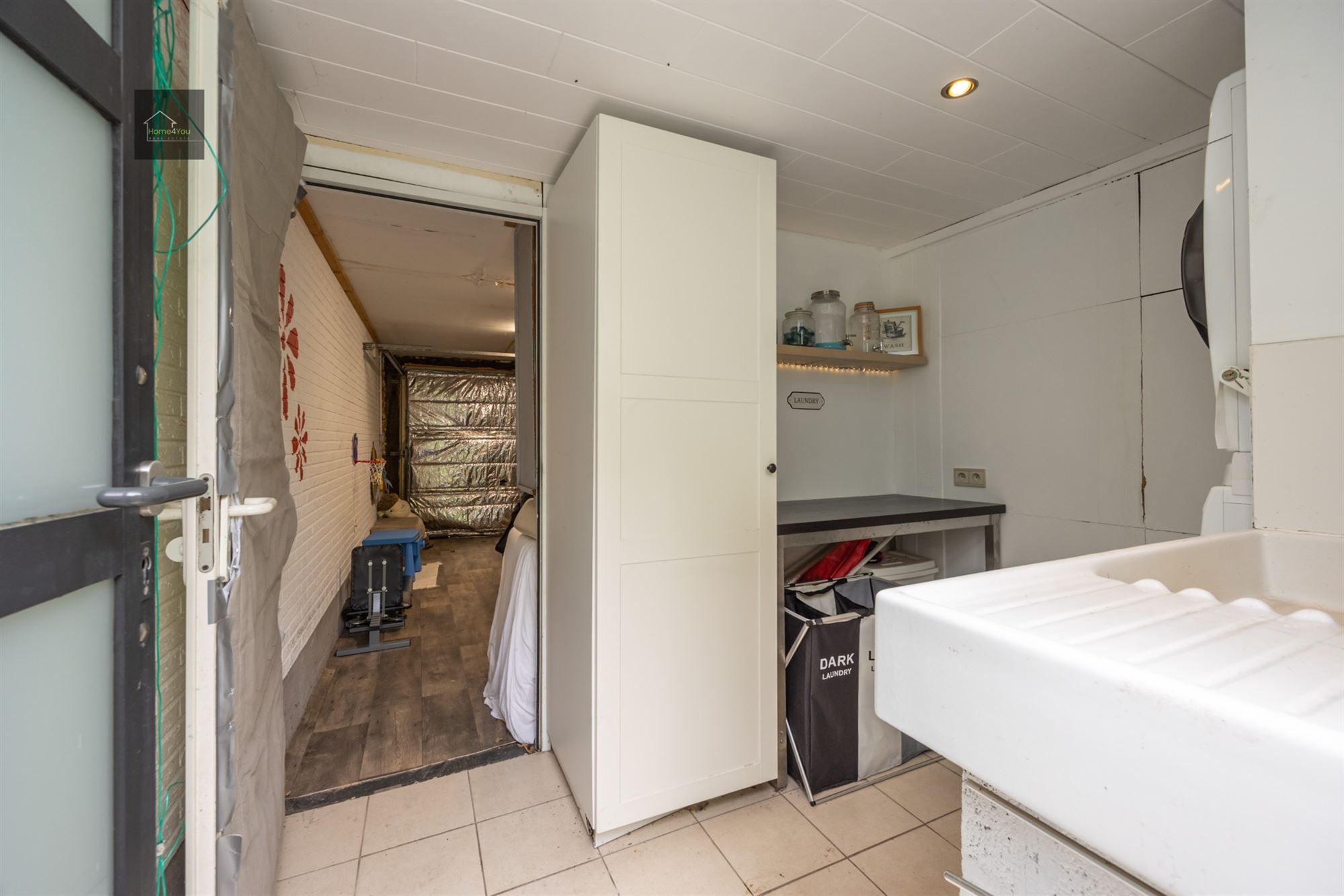 Gelijkvloers appartement met grote tuin en garage foto 15