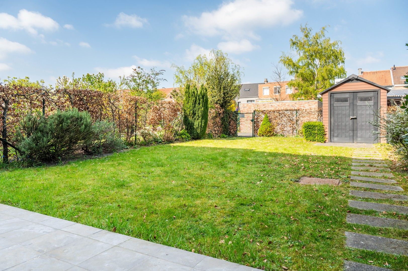 Instapklaar gelijkvloers appartement met tuin + optioneel een garage box! foto 9