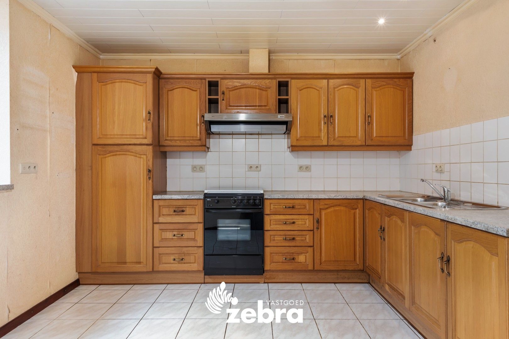 Op te frissen woning met vier slaapkamers te Assebroek! foto 4