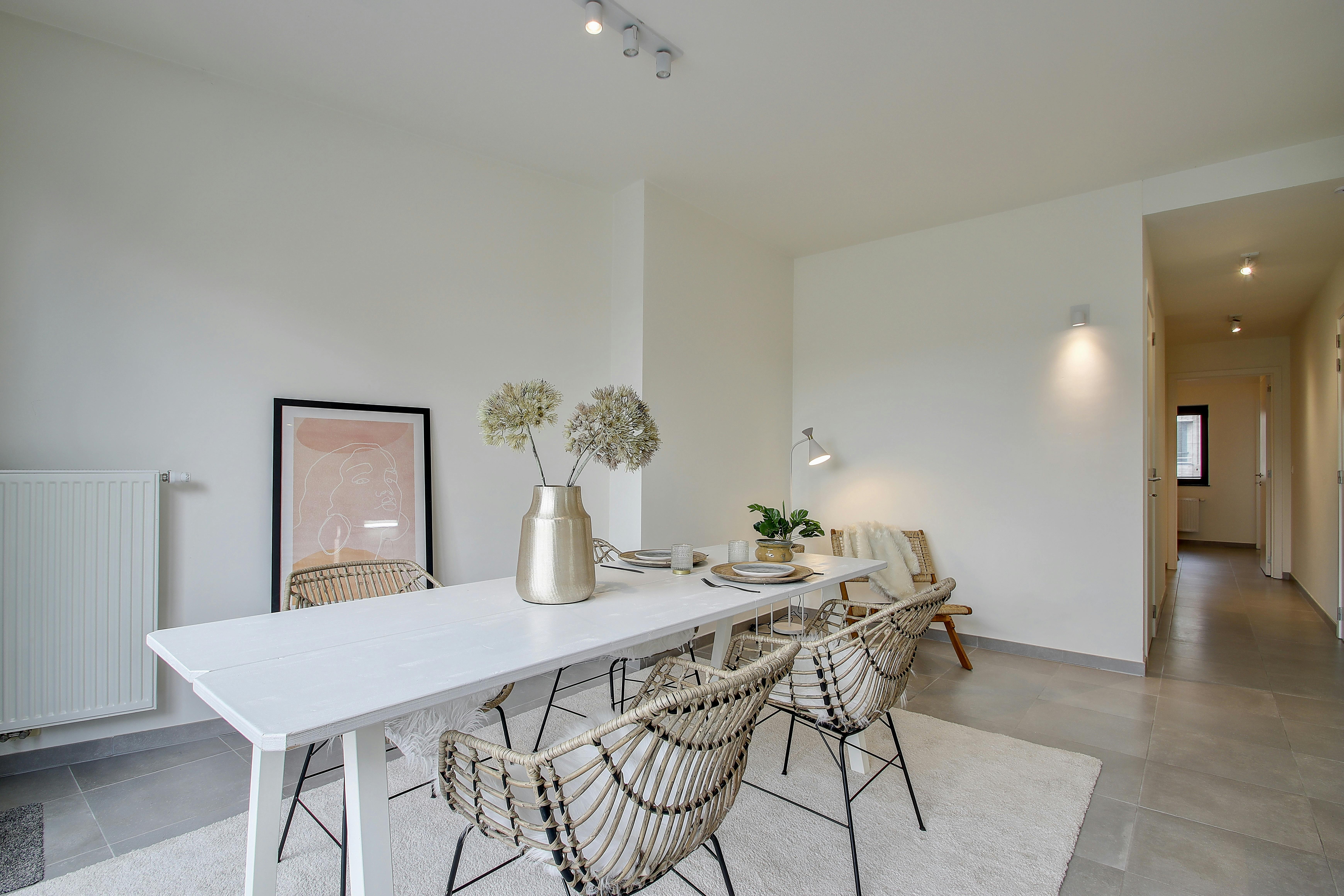 Ruim nieuwbouwappartement te koop in het centrum. foto {{pictureIndex}}