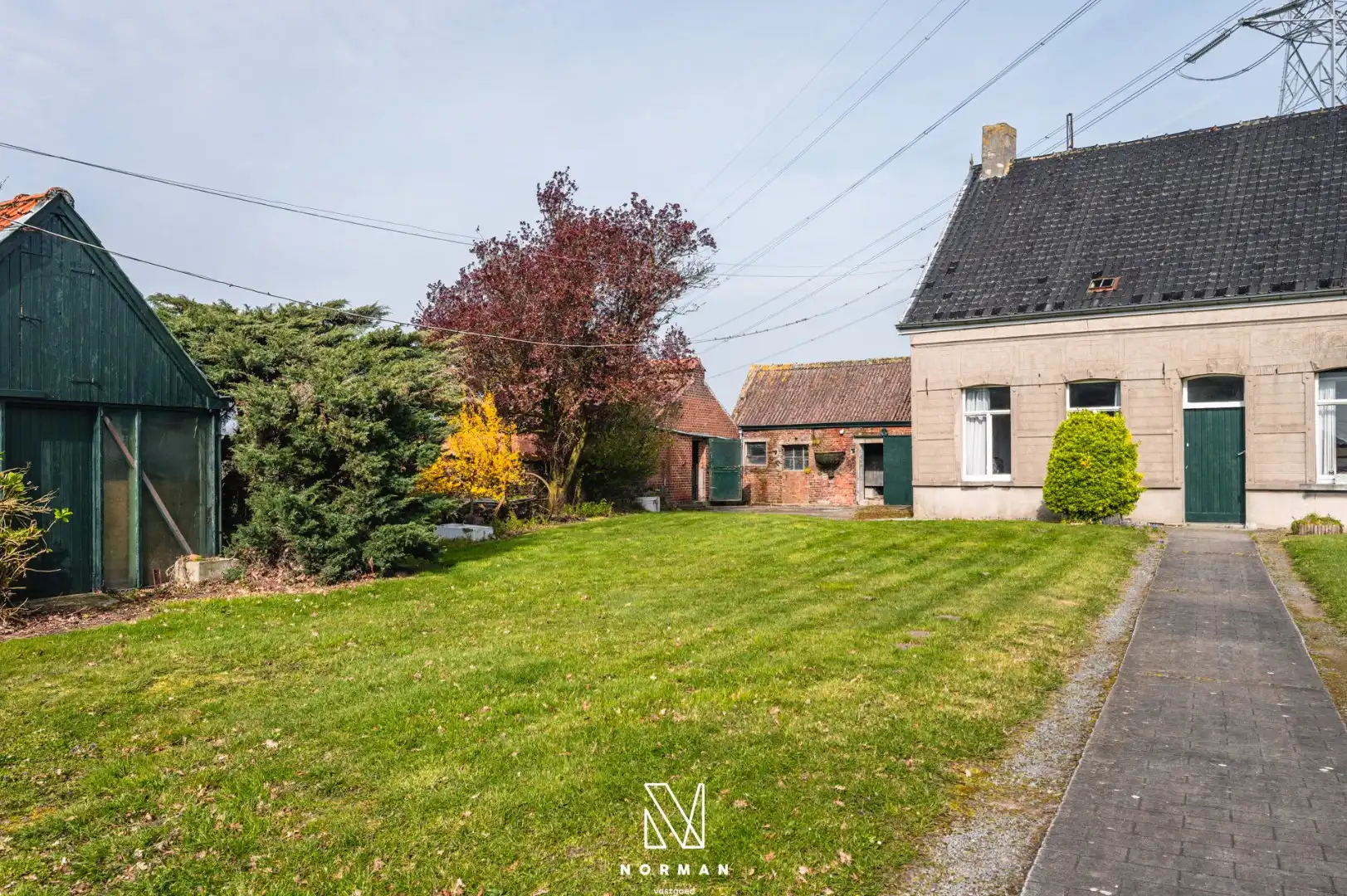 Unieke erfgoedhoeve op 33400 m² met dreef, bijgebouwen en landelijke vergezichten foto 8