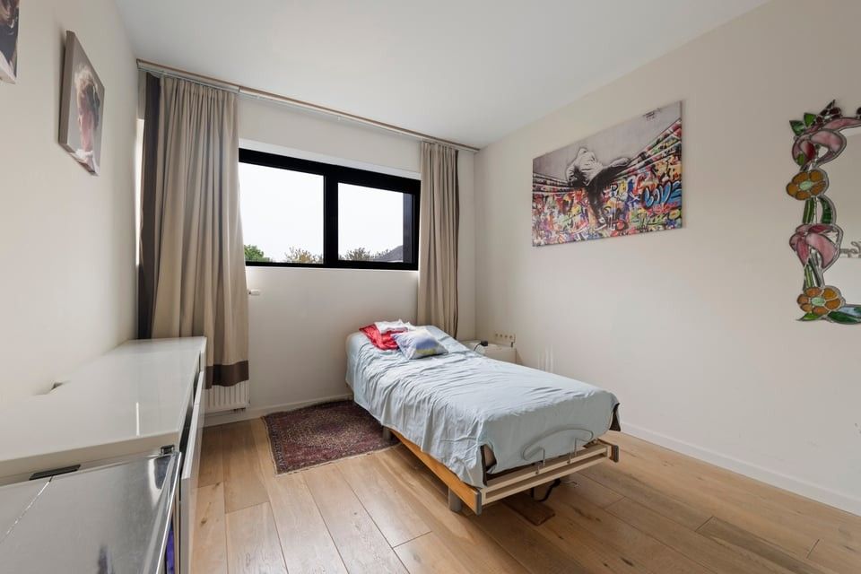 MODERN GELIJKVLOERS APPARTEMENT MET TERRAS EN STAANPLAATS IN SINT-TRUIDEN foto 21