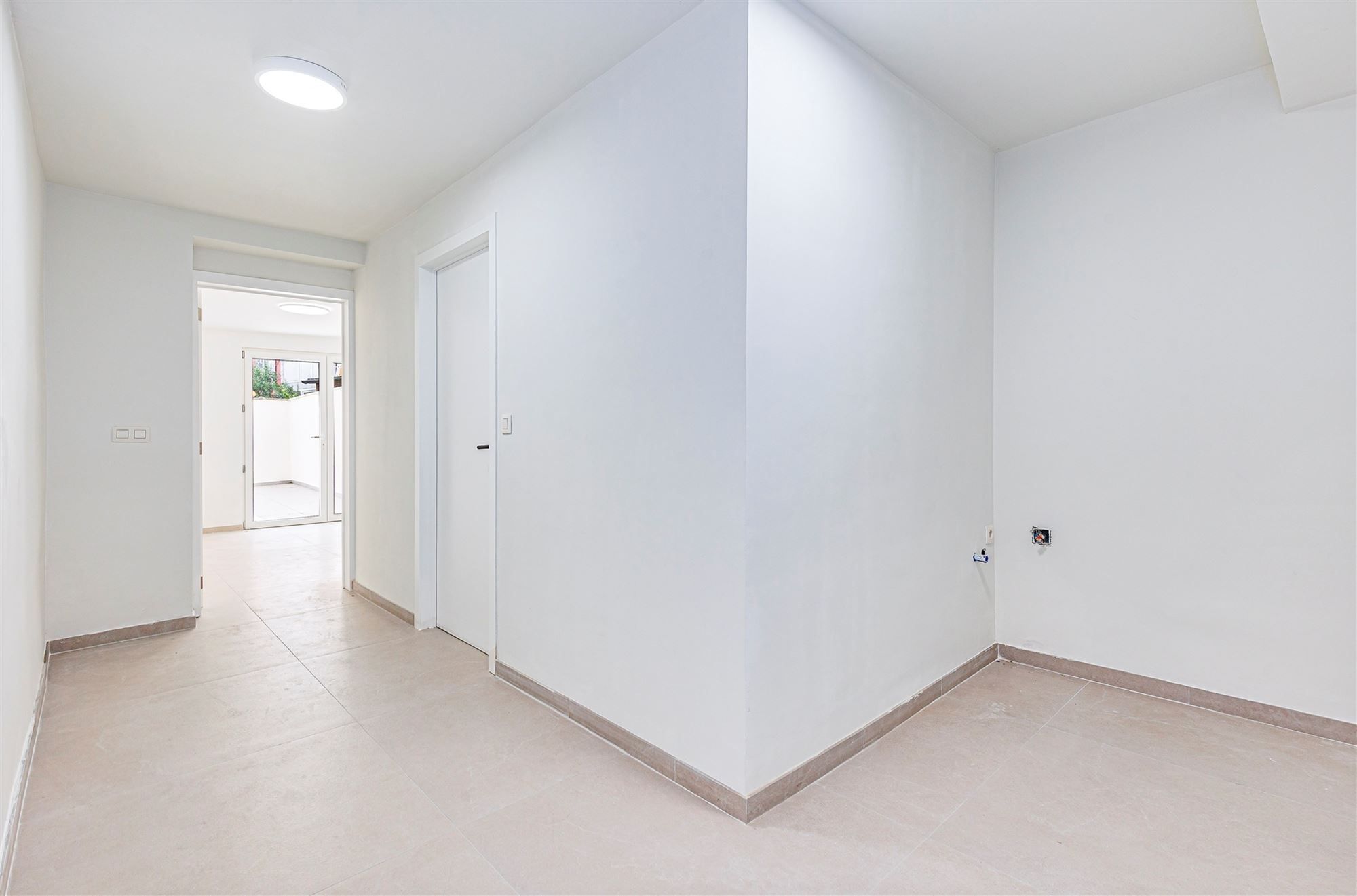 Gelijkvloers duplexappt met 3 slk + tuin foto 18