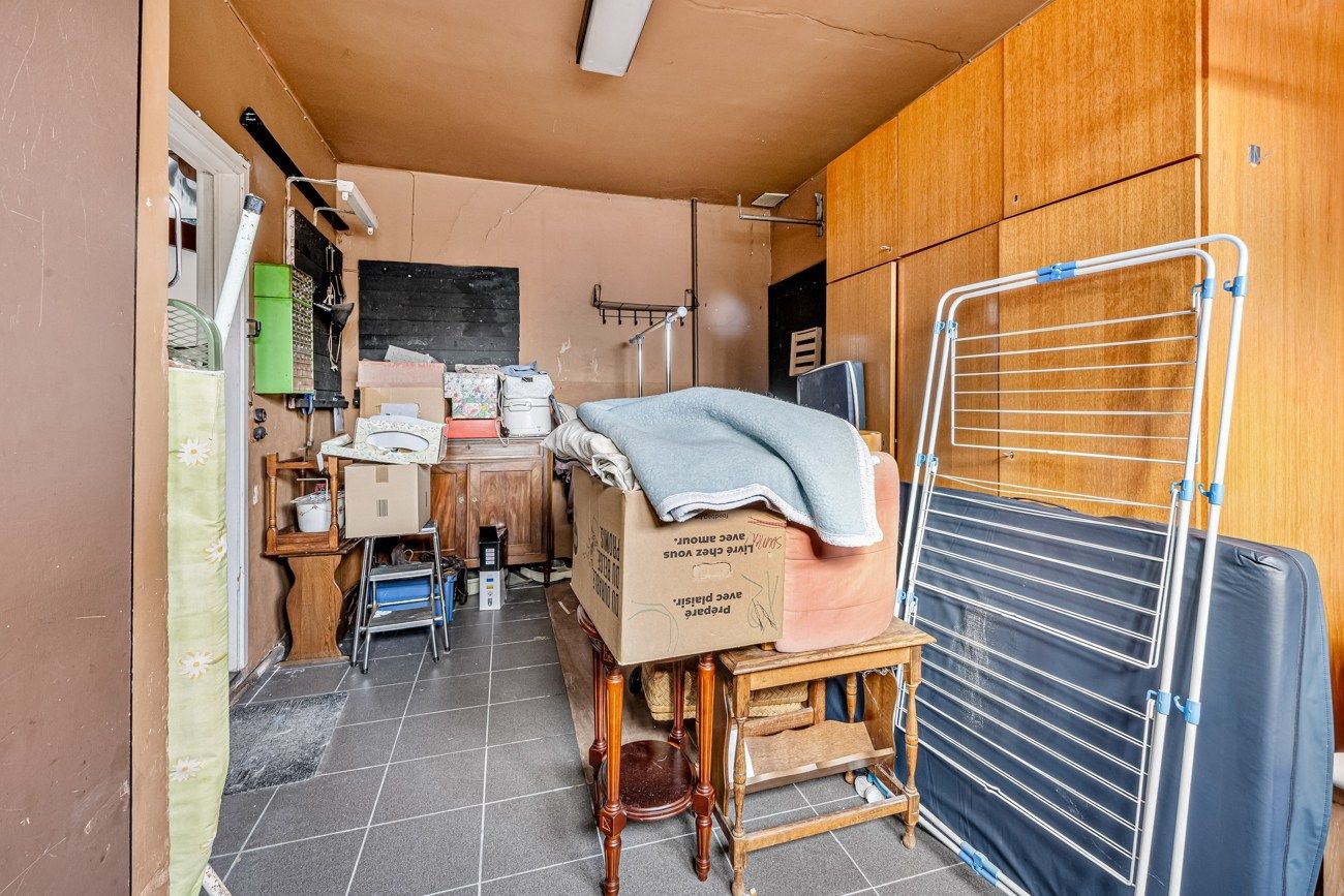 Gezellige, te renoveren, woning met charmante tuin aan een groenzone foto 16