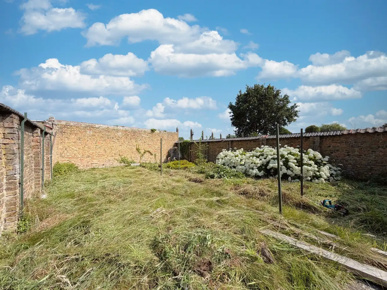 Ruime woning met polyvalente ruimte, zonnige tuin en tal van mogelijkheden foto 18