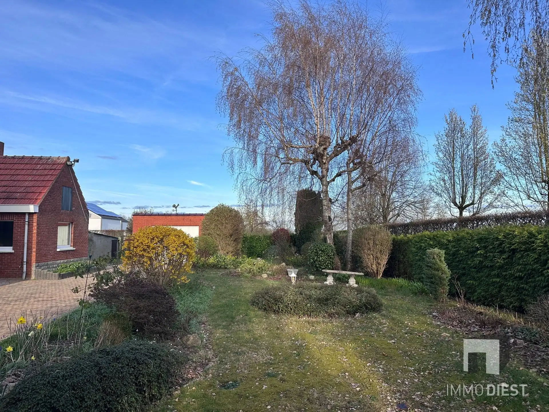 Stevige woning met 3 slpks en tuin + bouwgrond foto 29