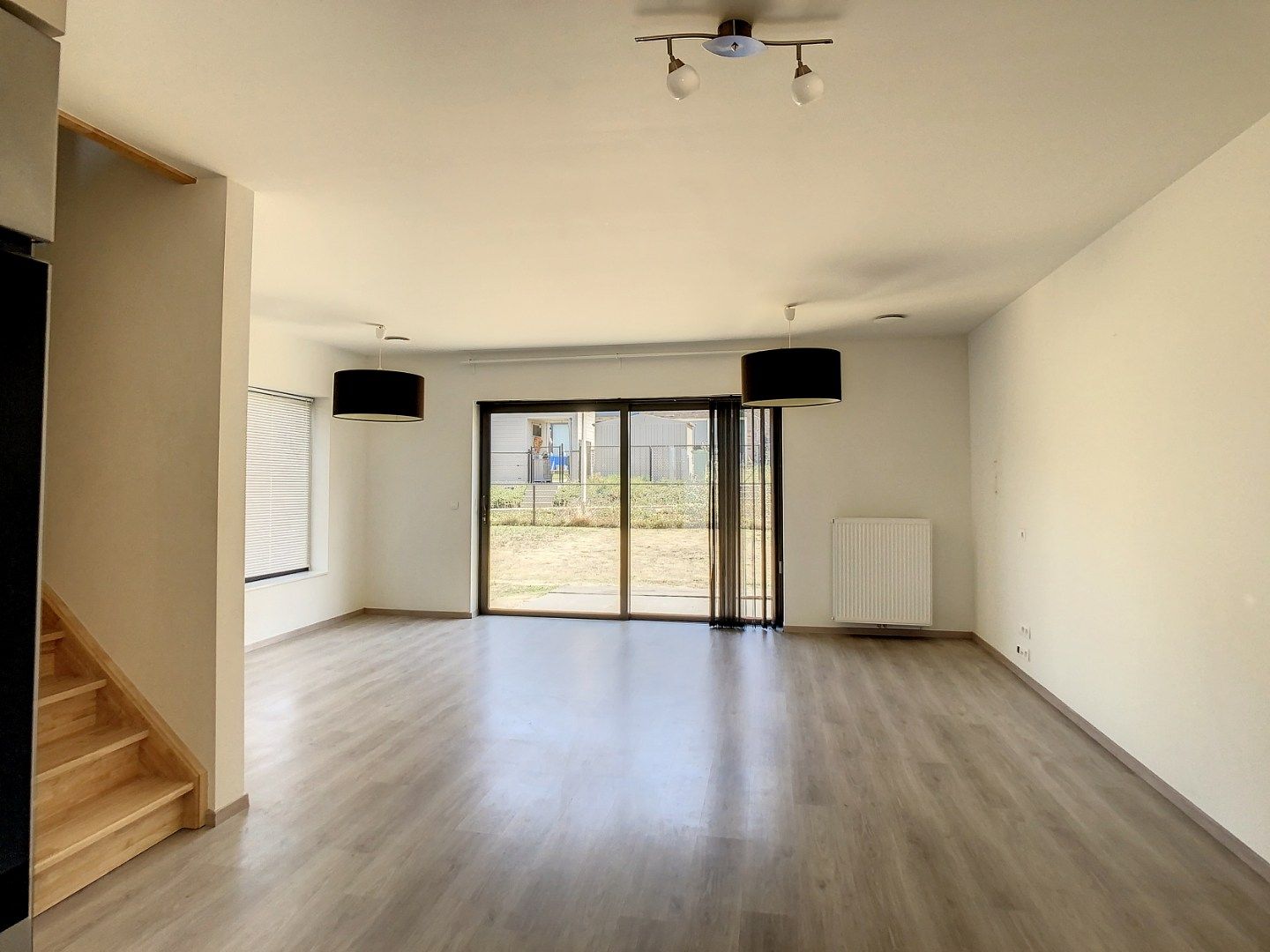 Recente woning met 3 slaapkamers, berging, carport en tuin te Tongeren foto 2