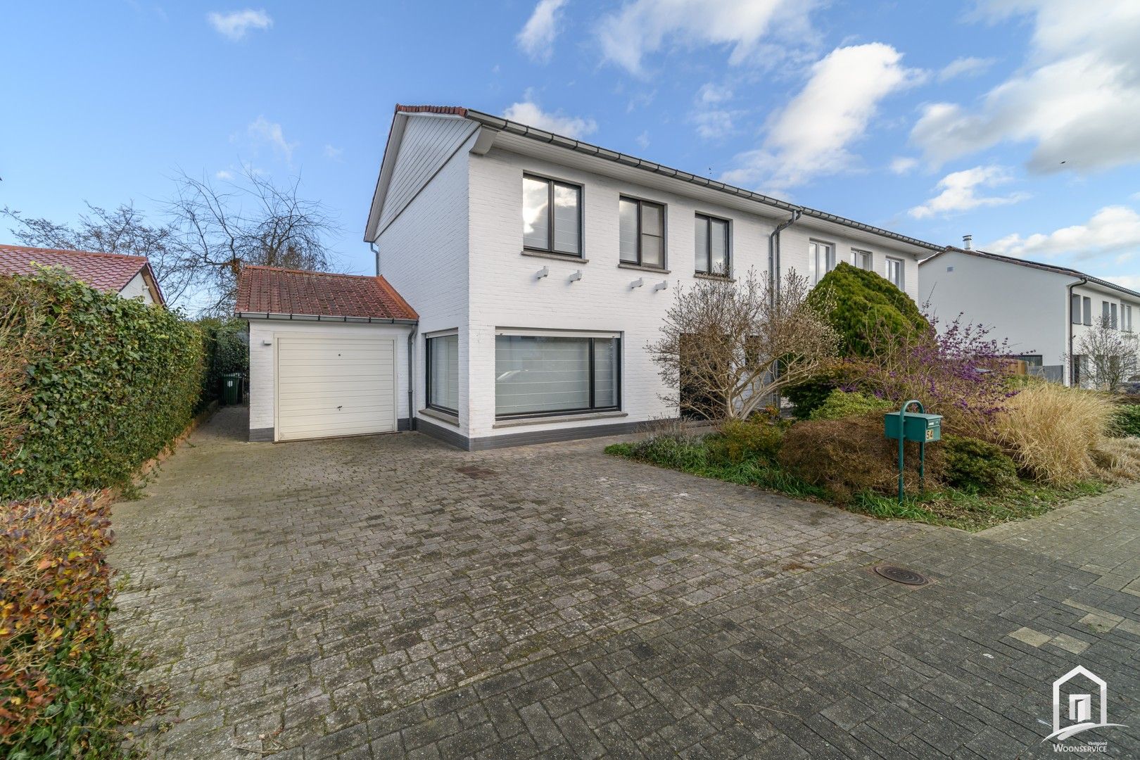 Instapklare halfopen bebouwing met tuin en garages in Denderleeuw foto 6