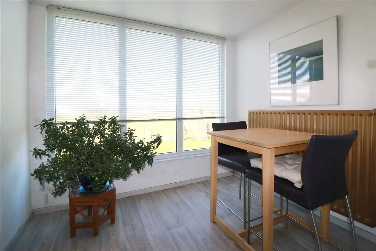 Gusting gelegen woning met 2 slpk, garage en tuin foto 13