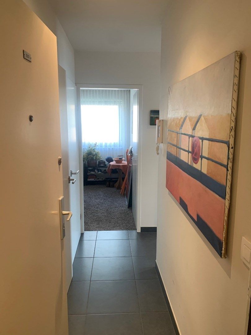 Gemeubeld appartement met twee slaapkamers én garagebox - frontaal zeezicht foto 2
