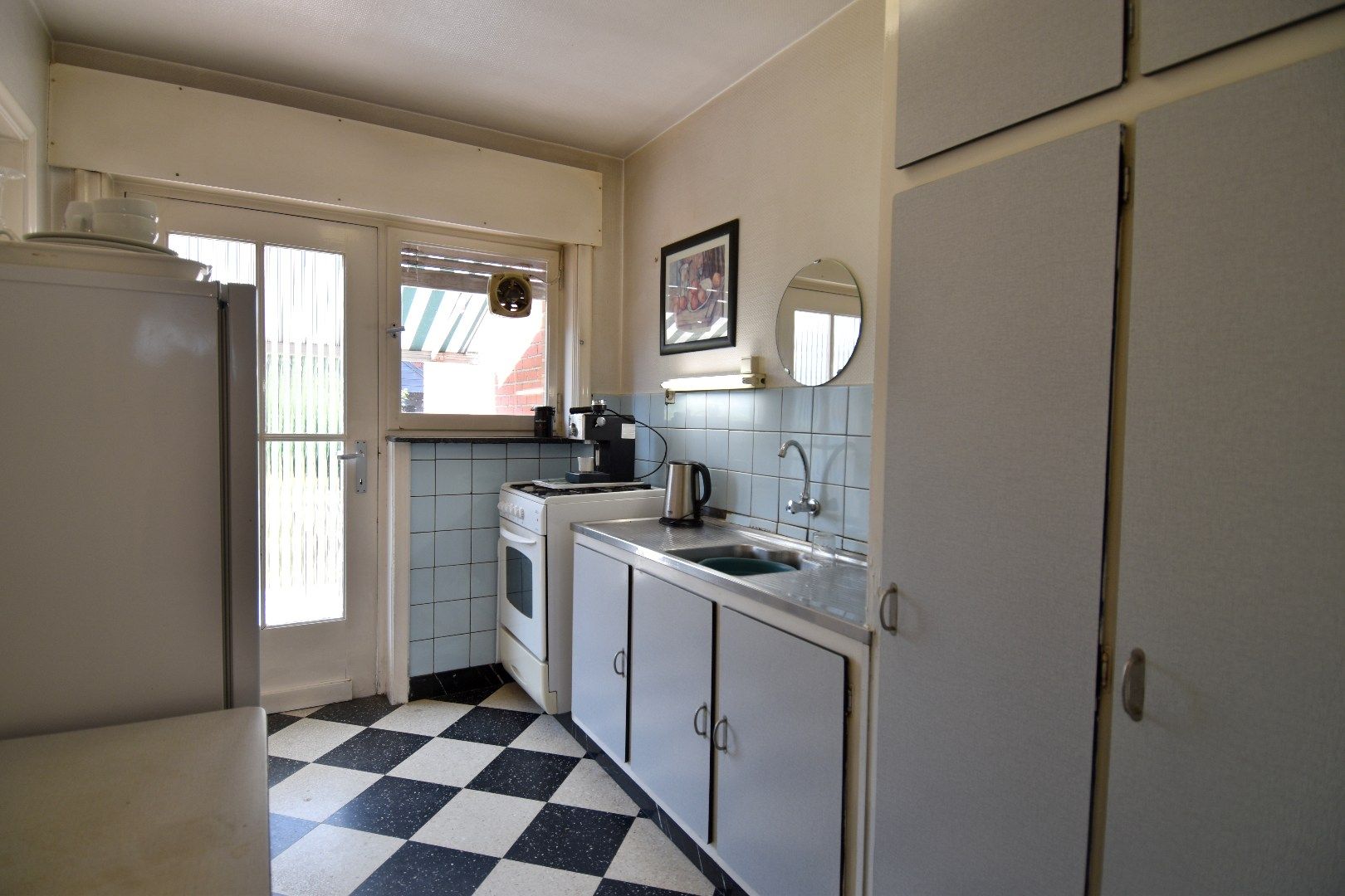 Rijwoning met 3 slaapkamers, garage en tuin te koop in een kindvriendelijke wijk te Kuurne foto 6