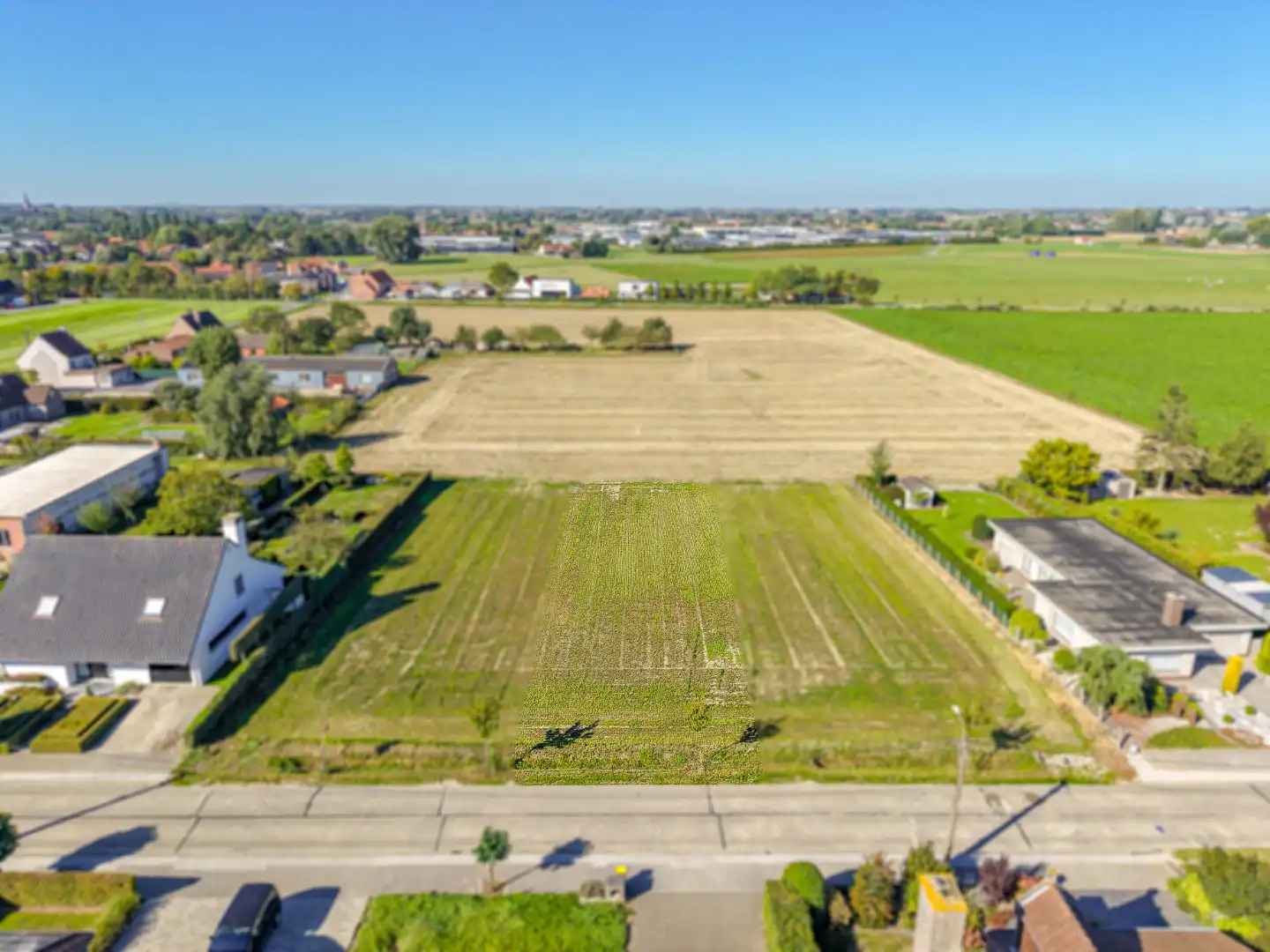 Bouwgrond voor een vrijstaande woning met landelijk uitzicht in Ledegem foto {{pictureIndex}}