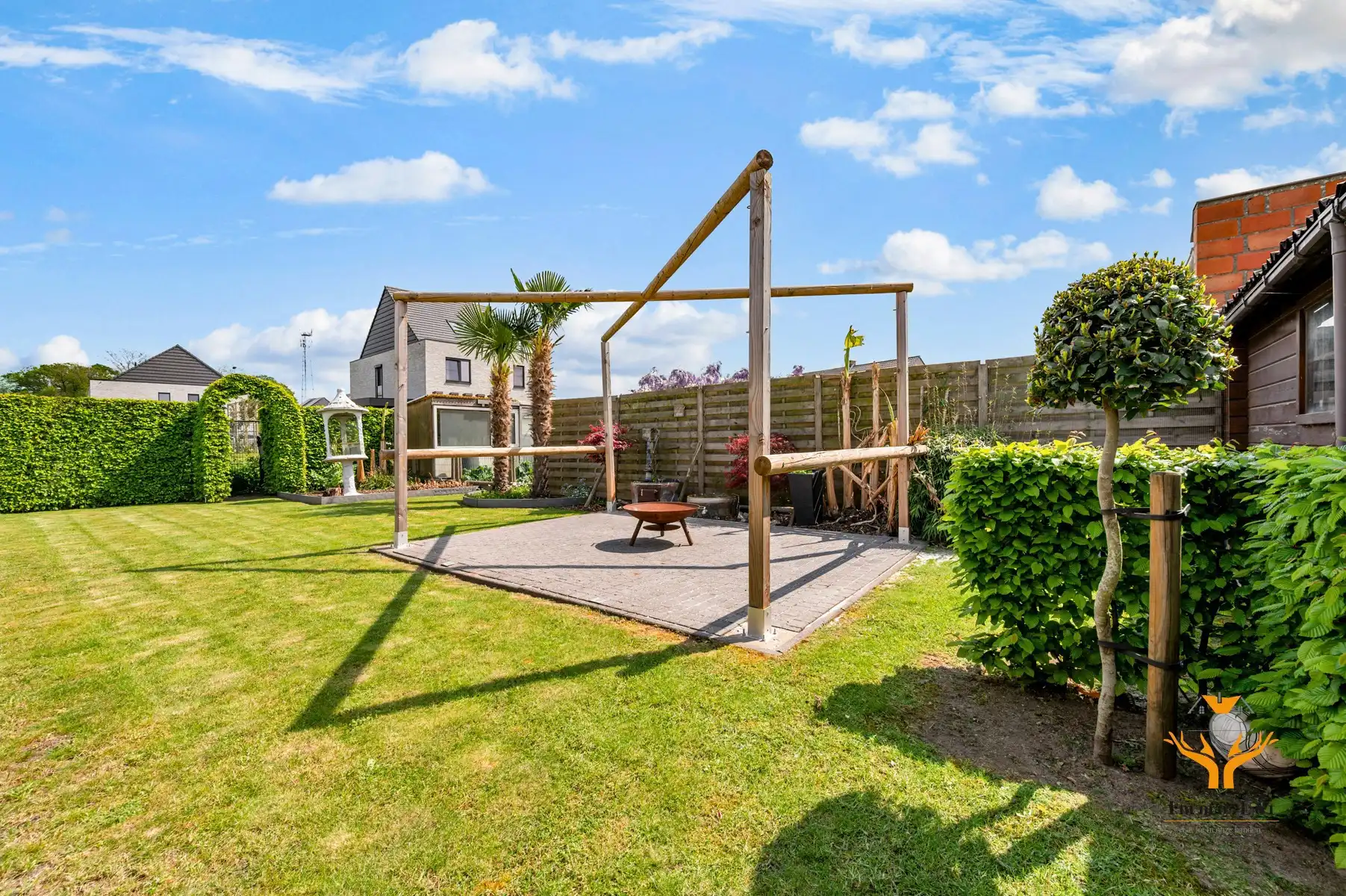 Halfopen bebouwing met tuin en garage in centrum Kalken foto 21