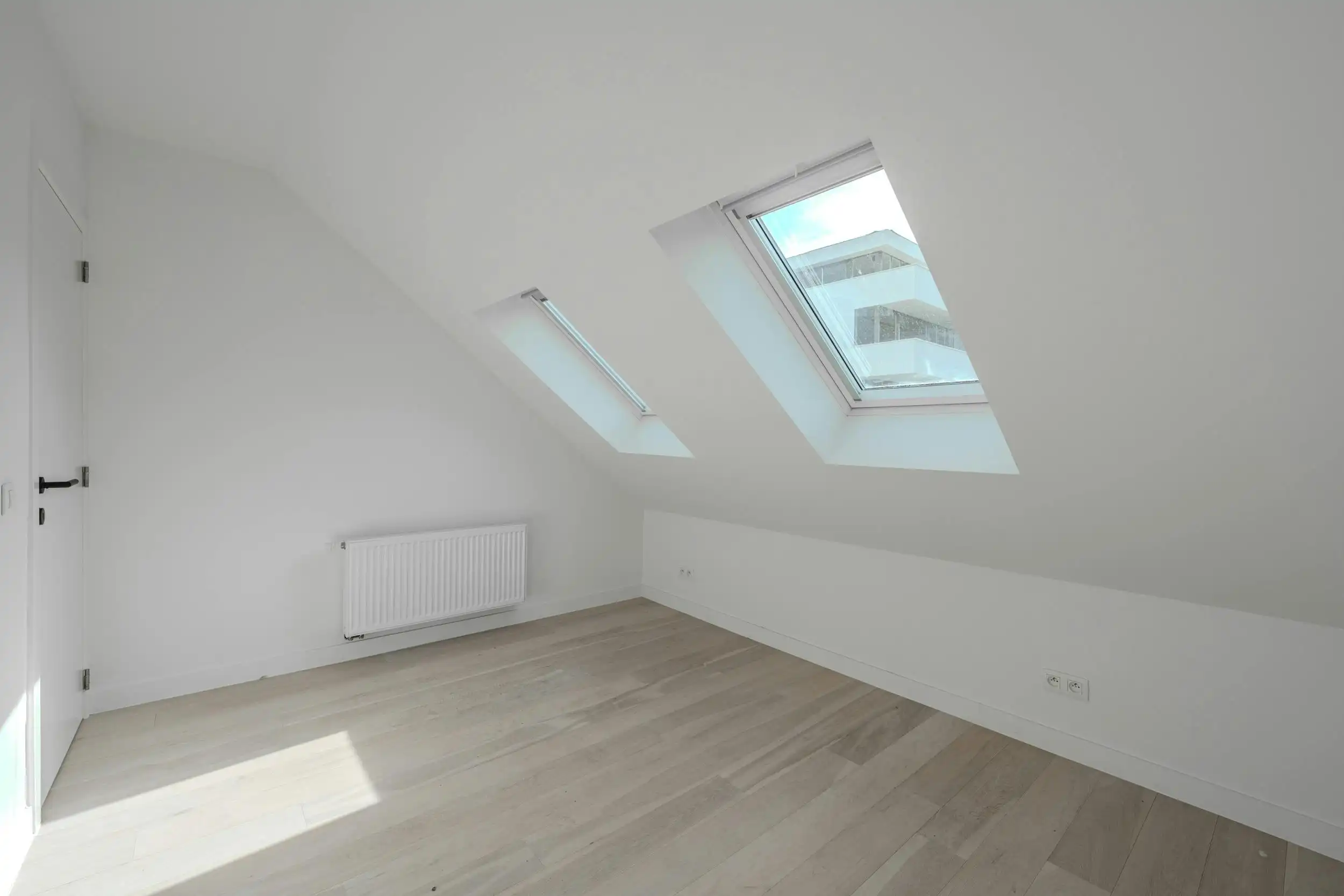 Magnifiek gerenoveerd duplexappartement te Oostende foto 13