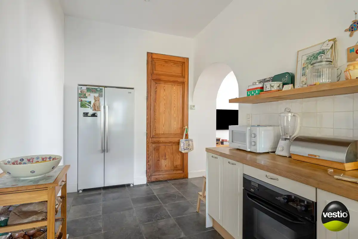 OPBRENGSTEIGENDOM VAN BUREEL, WONING, MAGAZIJN EN 2 APPARTEMENTEN TONGEREN LANGS N79. foto 11