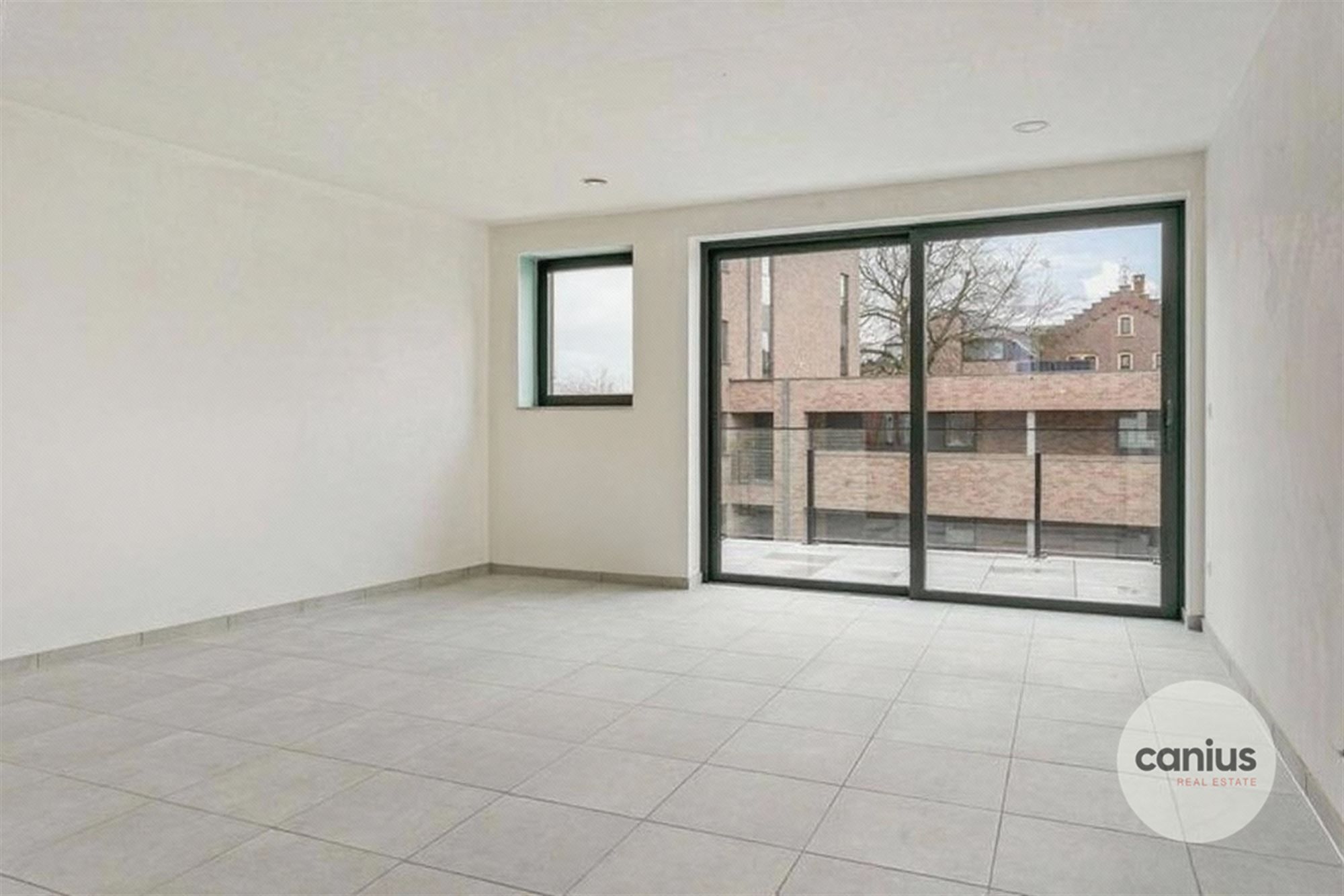APPARTEMENT MET 2 SLPKS NABIJ HET CENTRUM foto 3