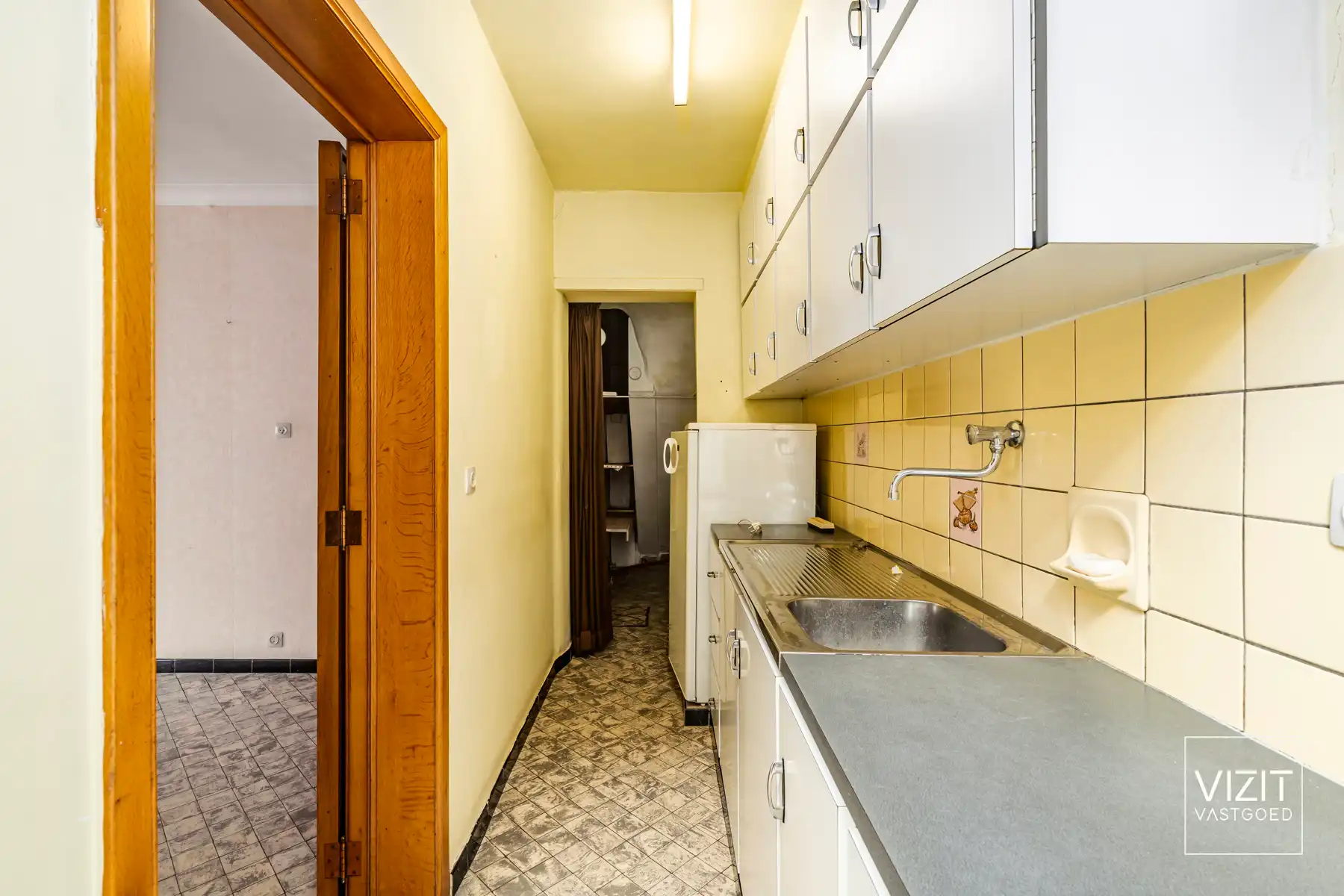 Halfopen woning met tuin en garage foto 12