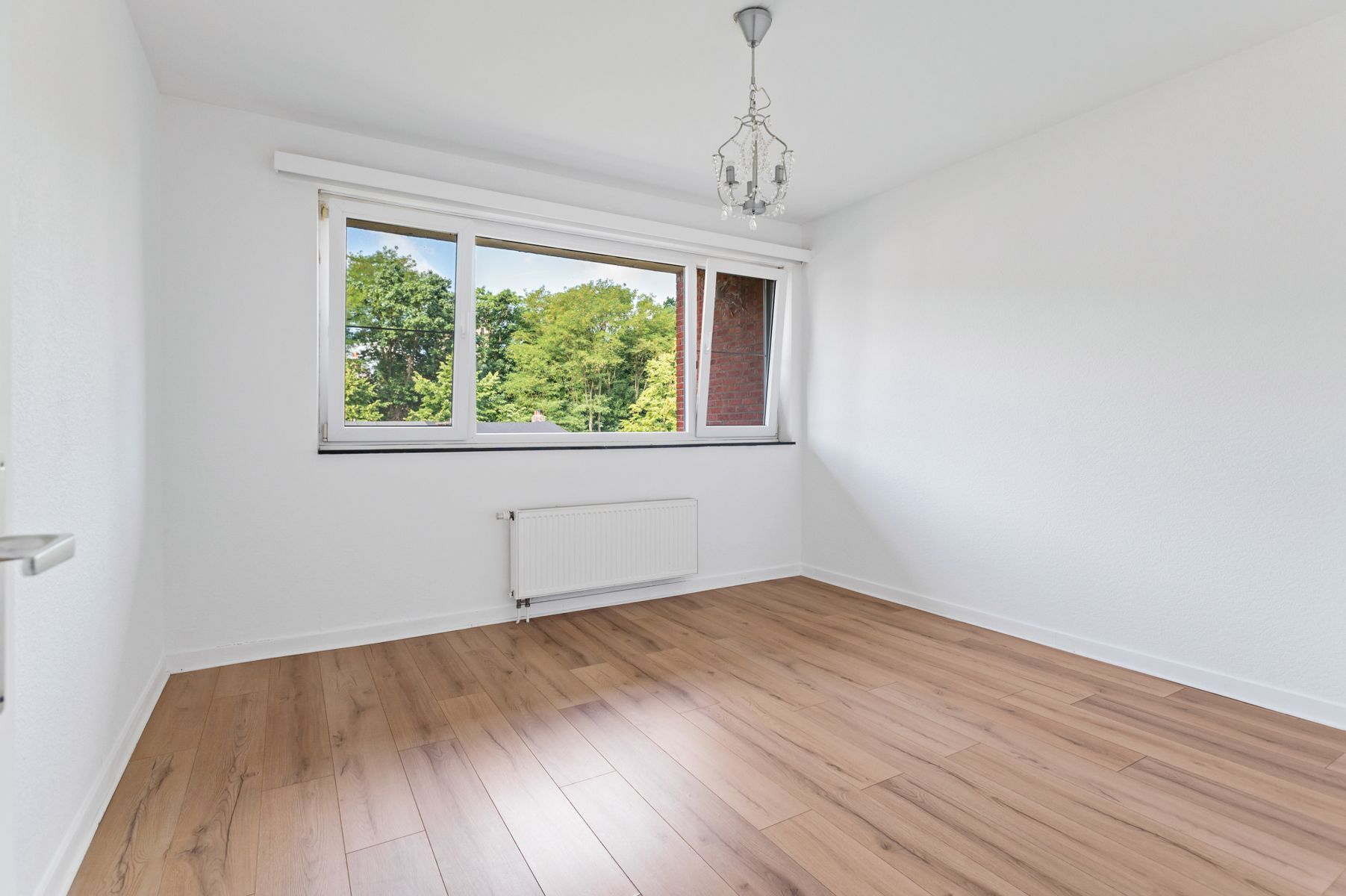 Unieke kans: appartement met tuin, garagebox en berging foto 11