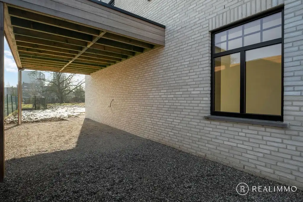Halfopen nieuwbouwwoning met grote tuin in landelijke stijl in Kerkhove foto 12