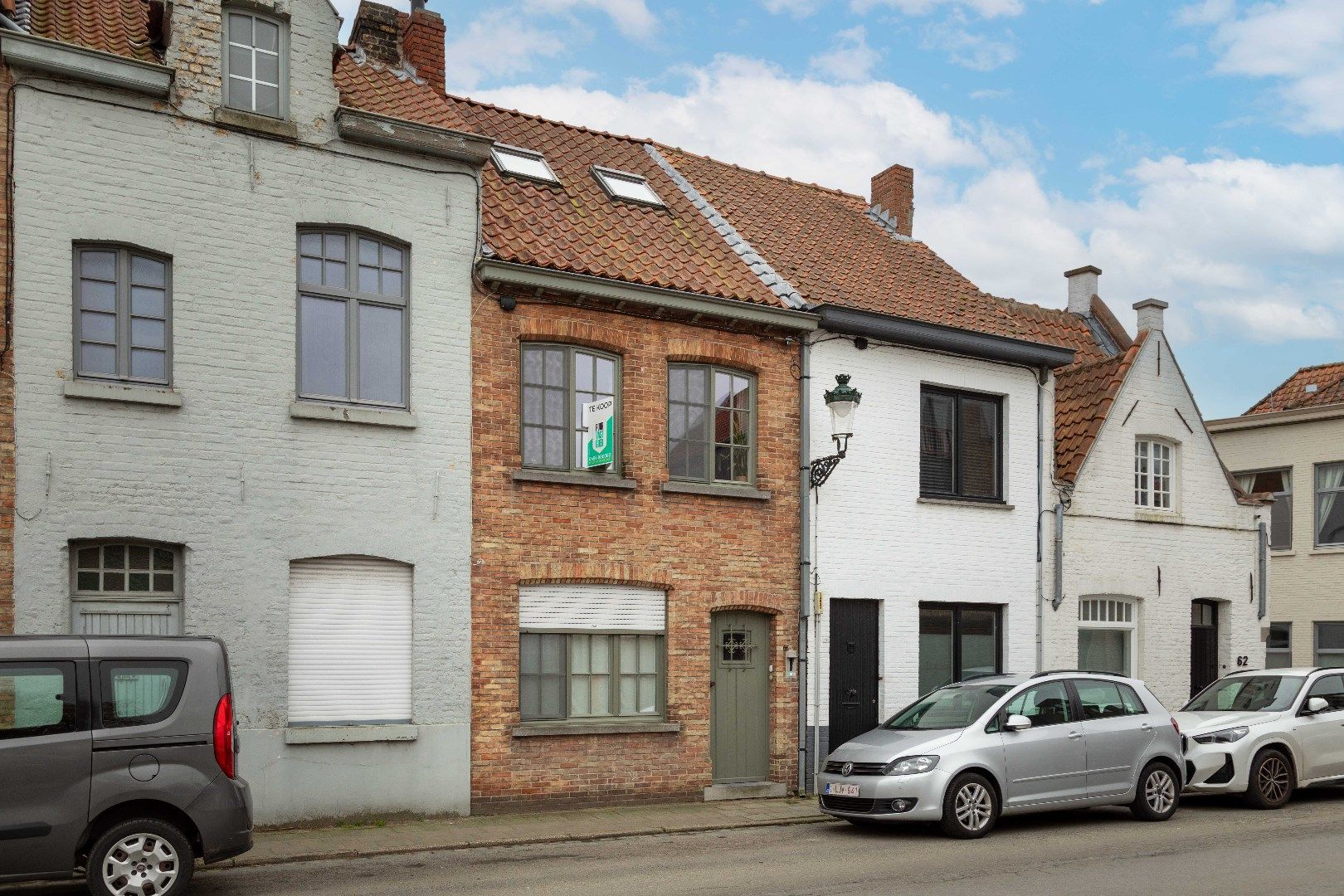 Gerenoveerde, lichtrijke woning met twee slaapkamers en zonneterras in hartje Brugge. foto {{pictureIndex}}