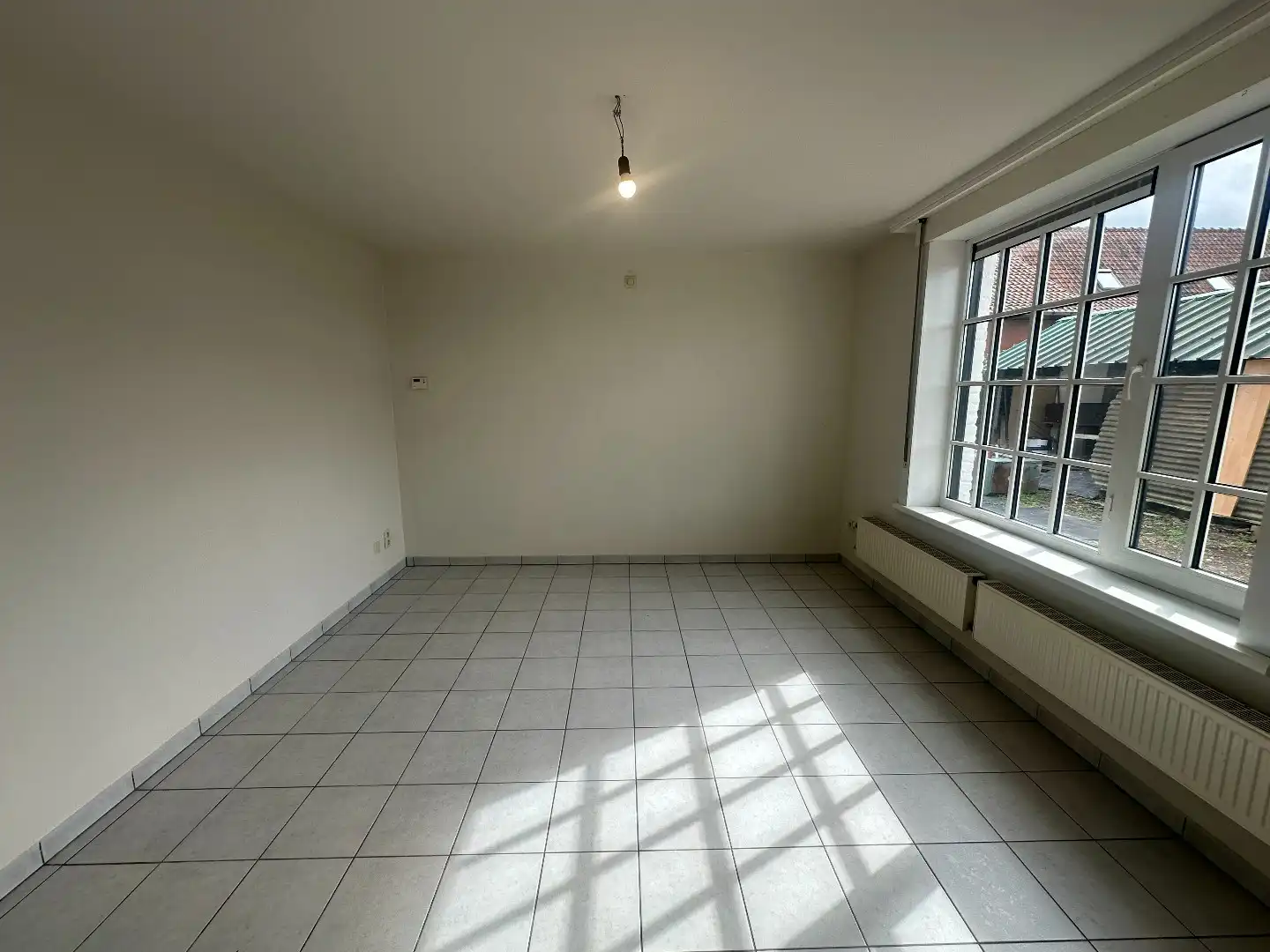 Gezellige gerenoveerde woning met 3 slpk, carport en tuintje, rustige ligging te Torhout foto 6