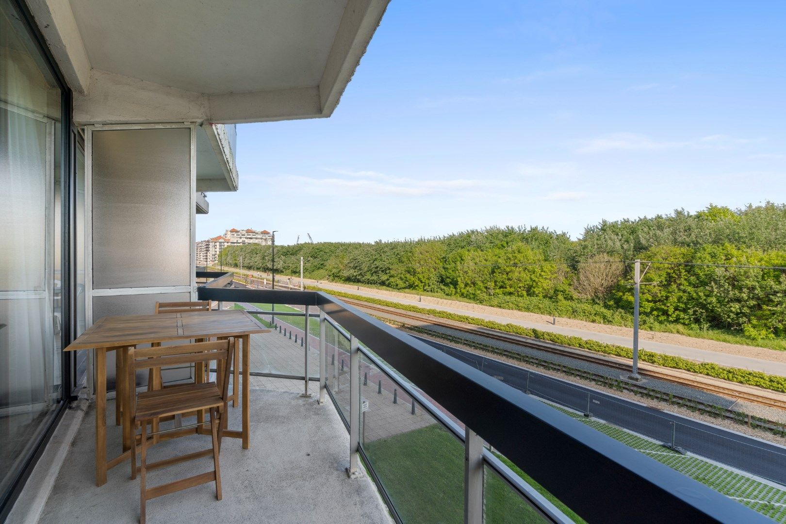 Verzorgd 2-slaapkamerappartement met open duinzicht en zeer gunstig EPC! foto {{pictureIndex}}