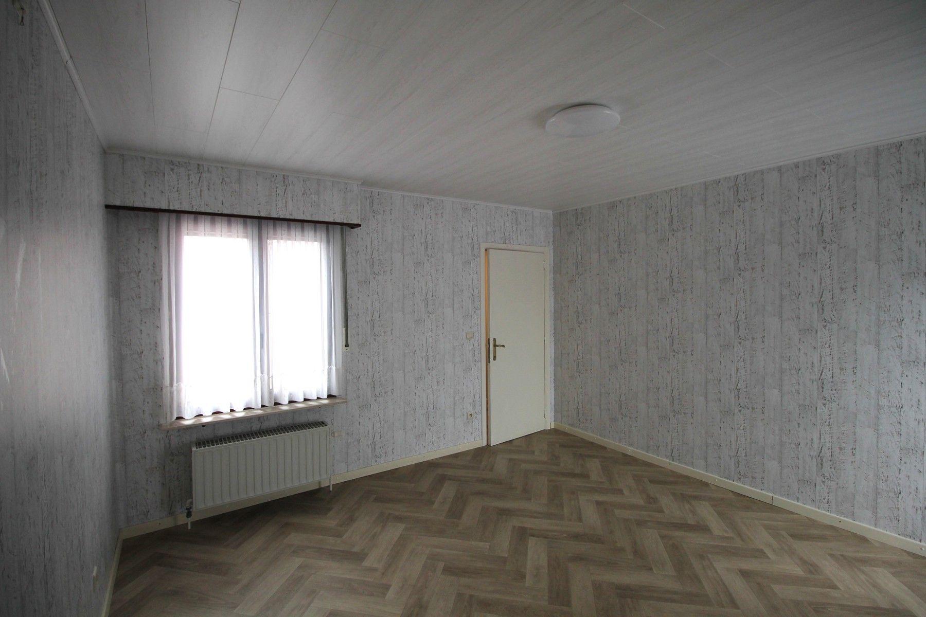 Een woning met 3 slaapkamers, garage en tuin vlakbij het centrum van Merksplas. foto 13