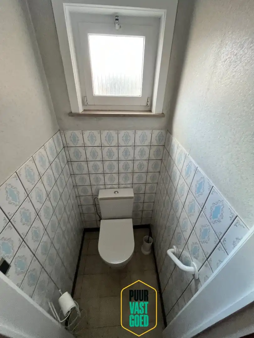 Vlot bereikbare en degelijke woning met tuin, garage en dubbele oprit. foto 13