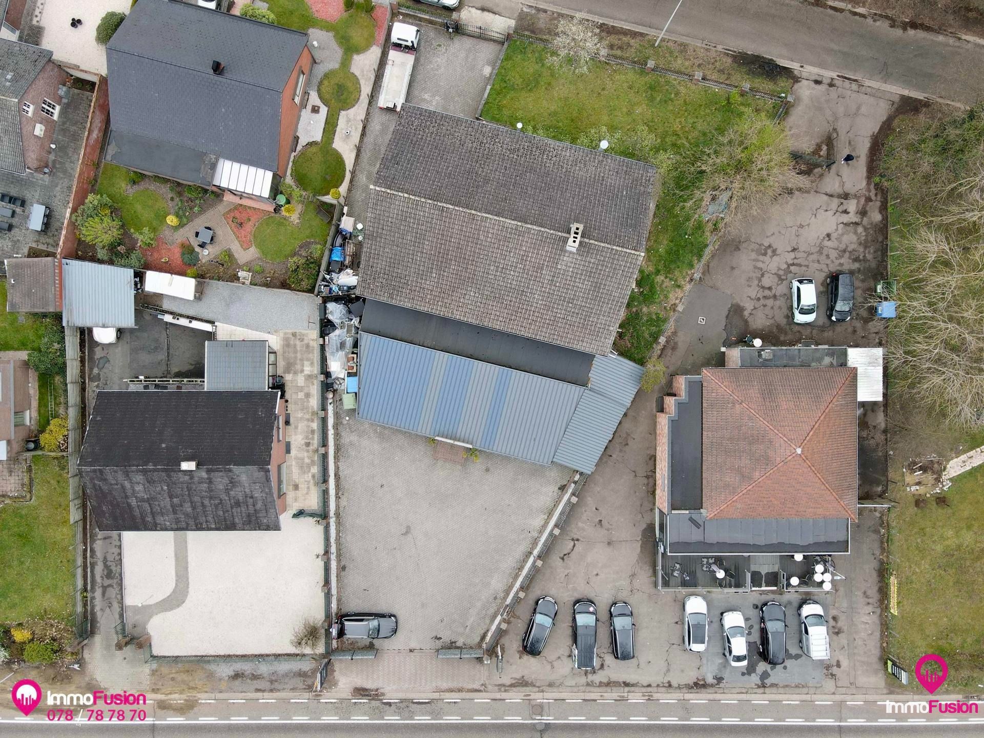 Riant handelspand met apart appartement + parking op toplocatie! foto 45