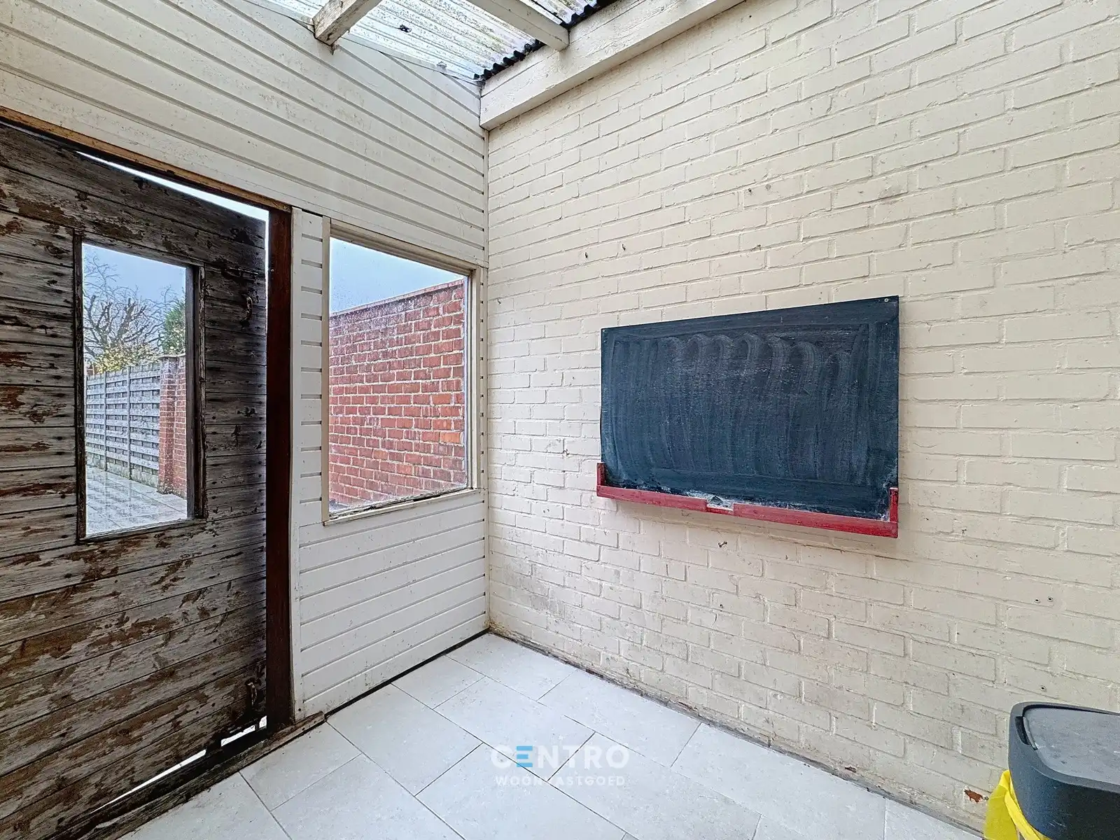 Op te frissen woning met 4 slpks én ZUIDger. tuin te Assebroek! foto 16