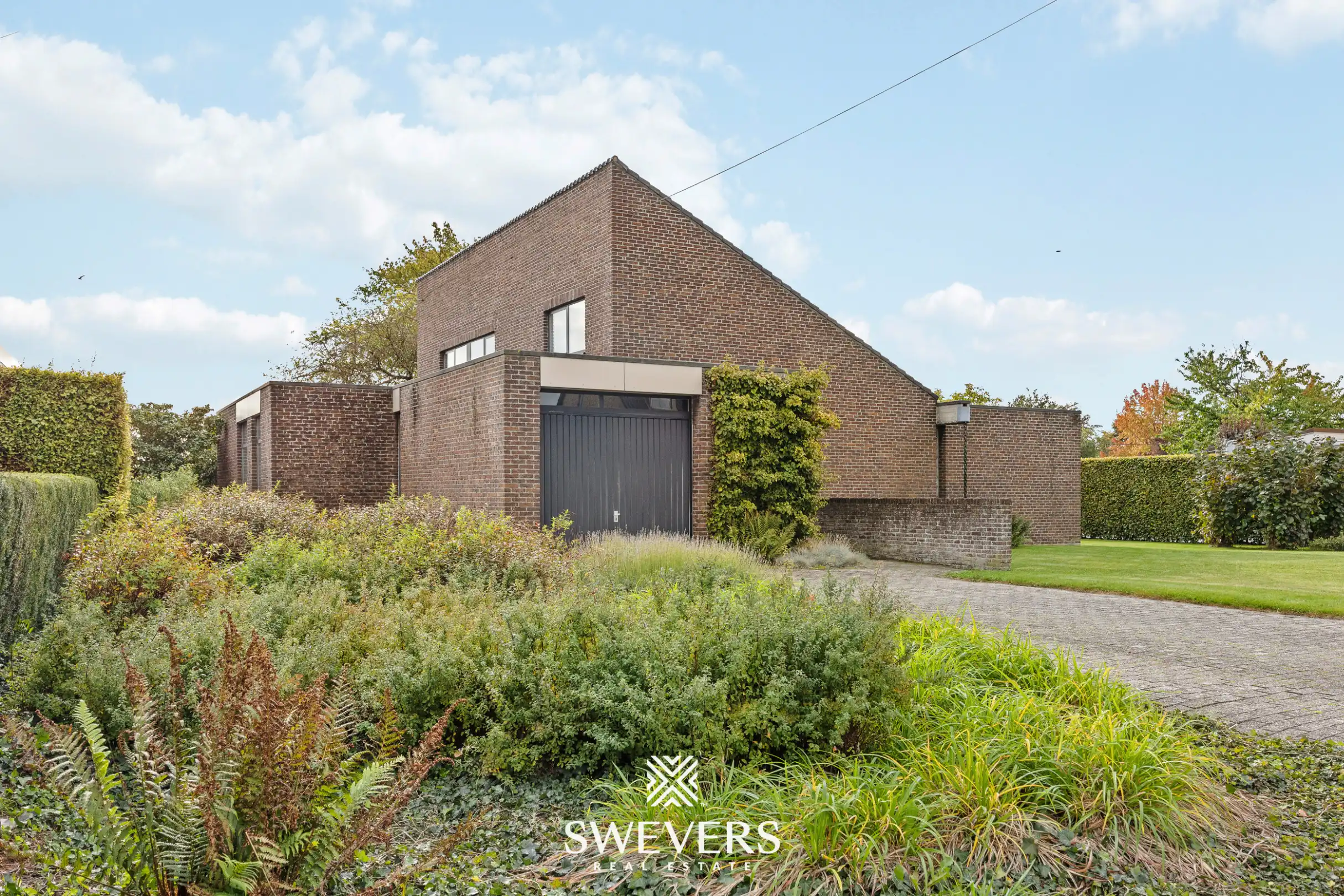 Vrijstaande woning op 13 are met mooie tuin en achterliggende toegang in Alken foto 33