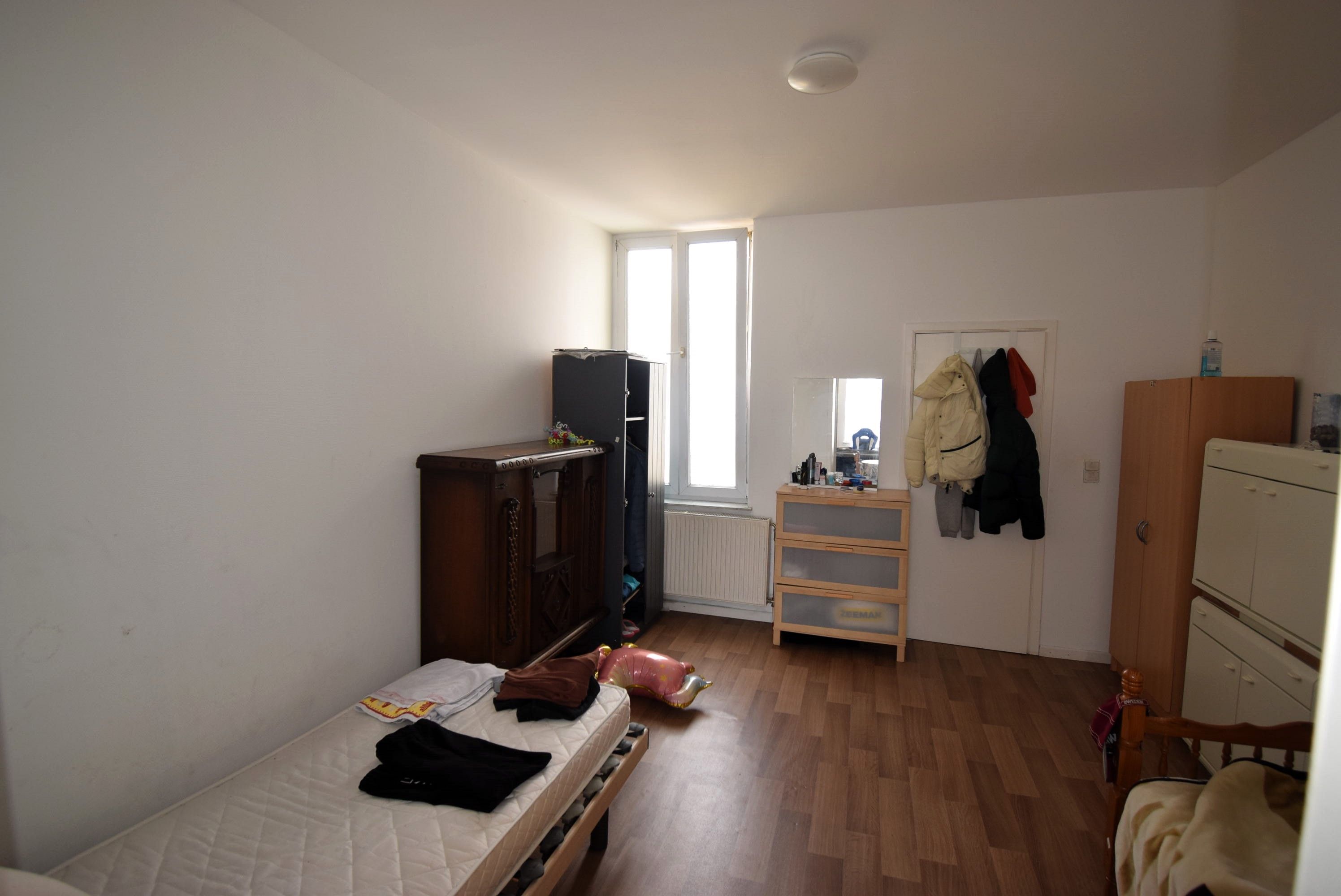 Opbrengstwoning met commercieel gelijkvloers en 4 appartementen foto 26