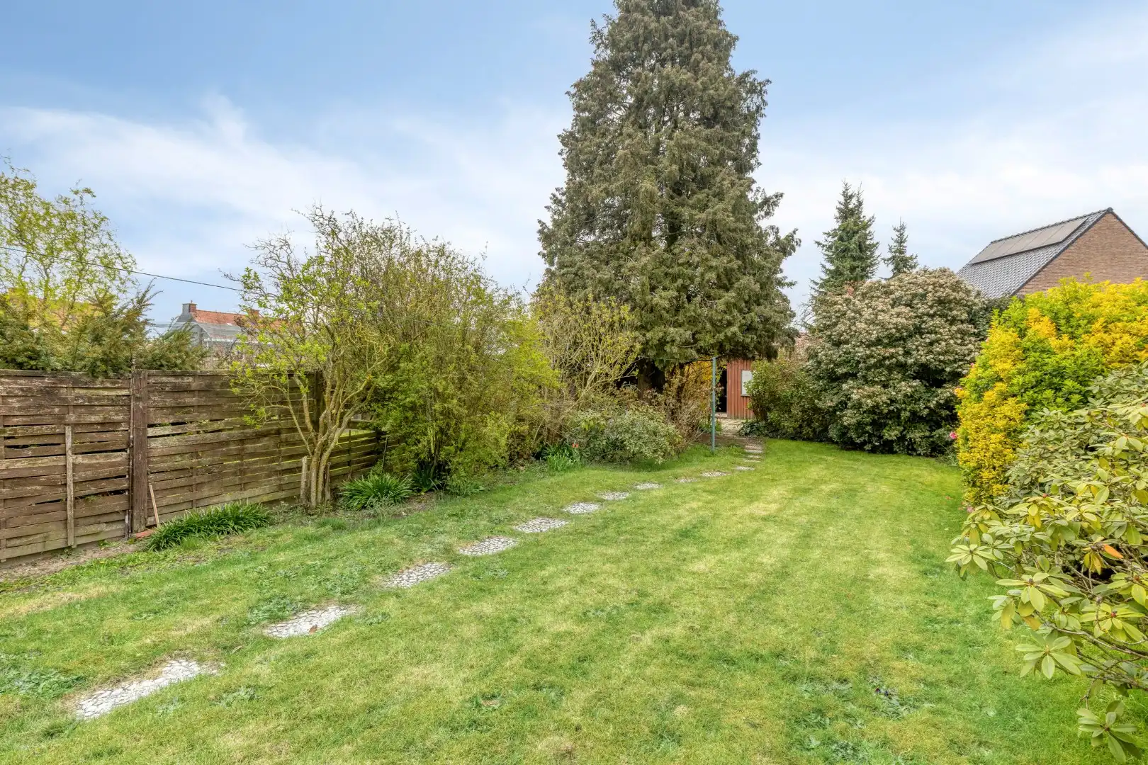 Te renoveren woning met 4 slaapkamers, garage en tuin op rustige ligging! foto 24