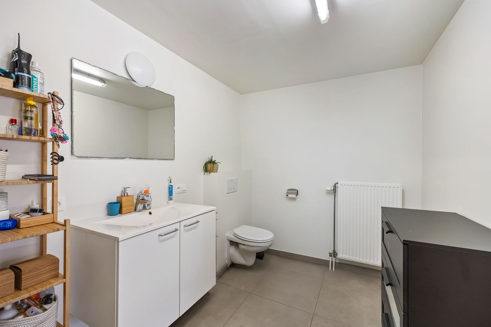 Trendy en ruim appartement met autostaanplaats en tuin in hartje Kapellen! foto 13