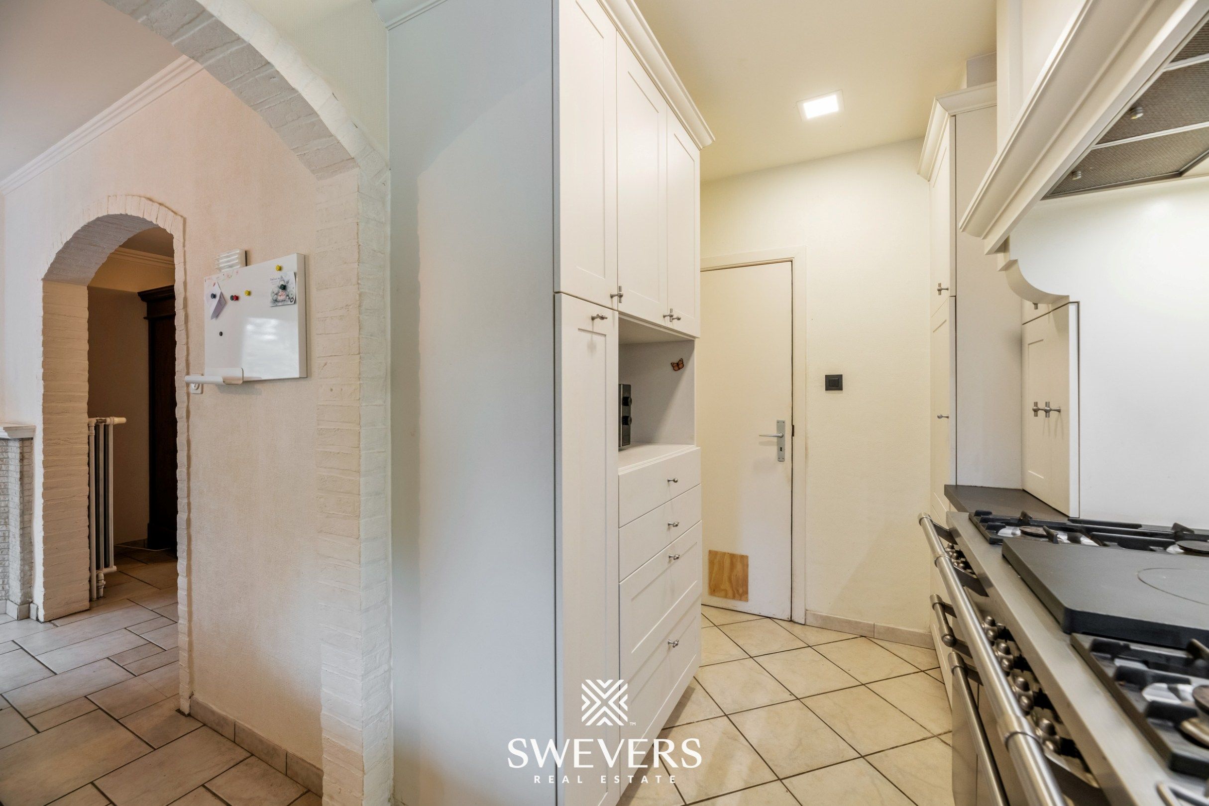 Instapklare gezinswoning met 3 slaapkamers, ruime kelder en zuidgerichte tuin in Beringen foto 12