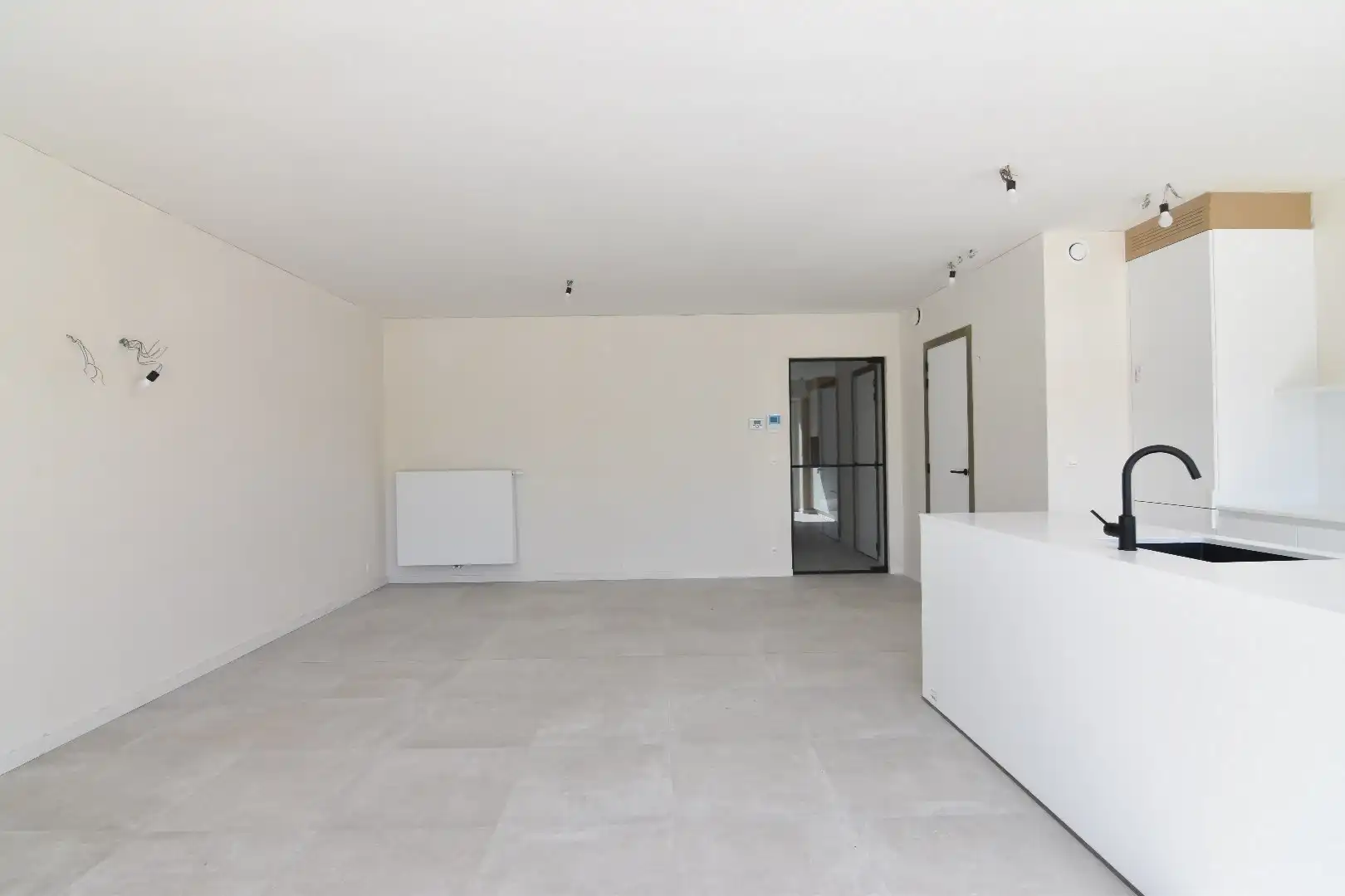 Nieuwbouwappartement gelijkvloers - één slaapkamer foto 2